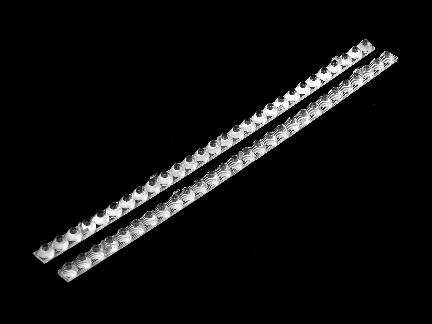 ASL280D10H28LED20G - Групповая линейная линза на 28 светоточек для светодиодов 2835/3030/3535, 93%, ~20°, 280x10mm H:8mm, PC