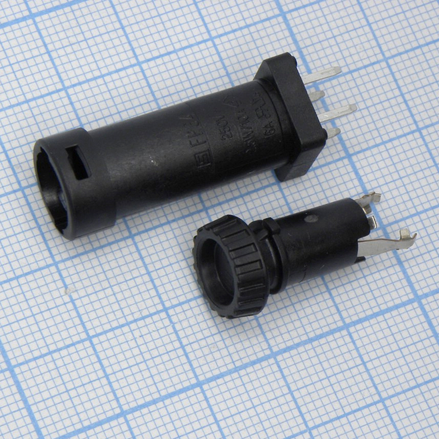 3101.0045 - Держатель предохранителя  5*20mm, закрытого типа, монтаж на плату вертикальный