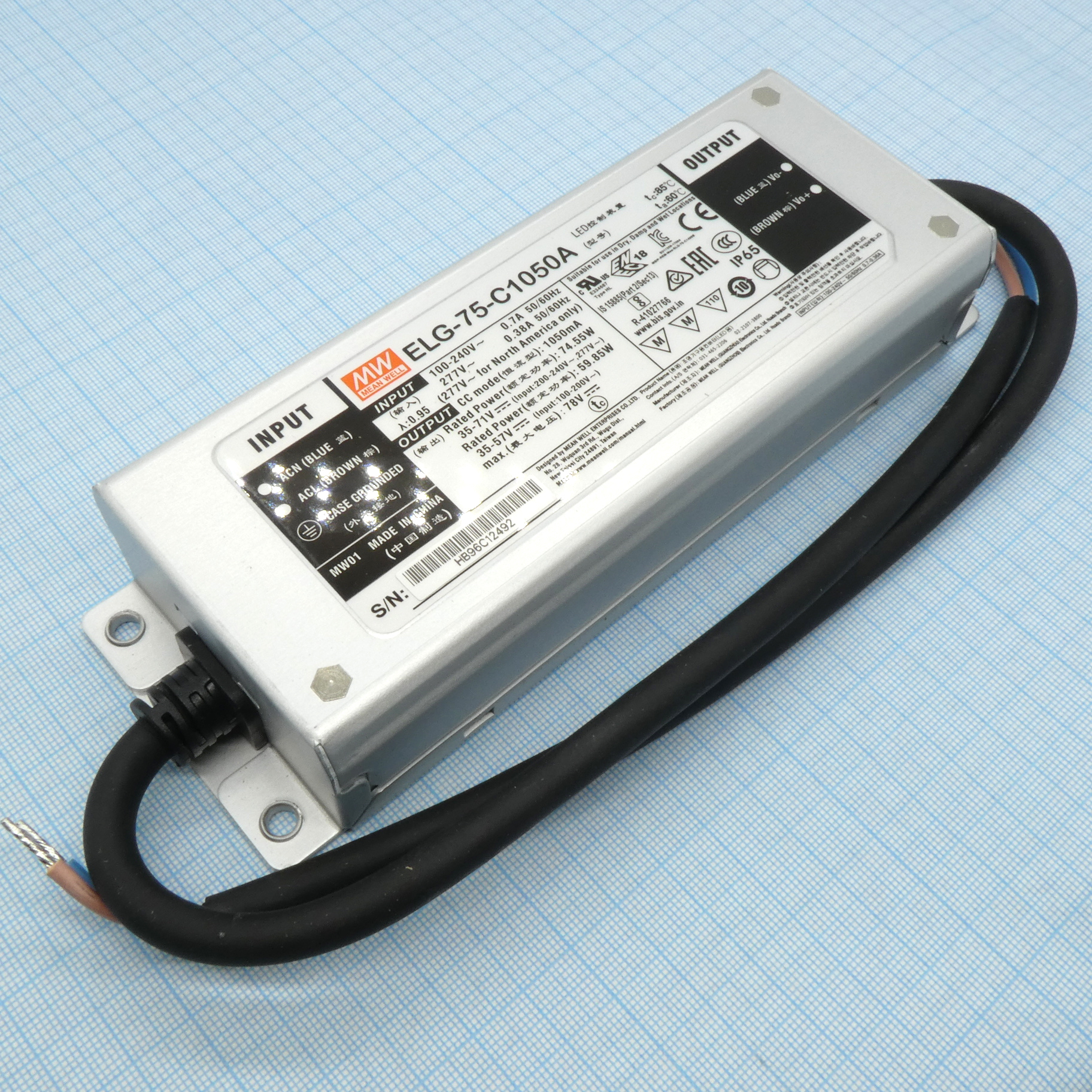 ELG-75-C1050A - AC-DC, 74.6Вт, IP65, вход 100…305В AC, 47…63Гц/142…431В DC, ККМ, выход 35…71В/1050мА, изоляция 3750В AC, в кожухе 180х63х35.5, -40…+85°С (корпус), рег. выхода