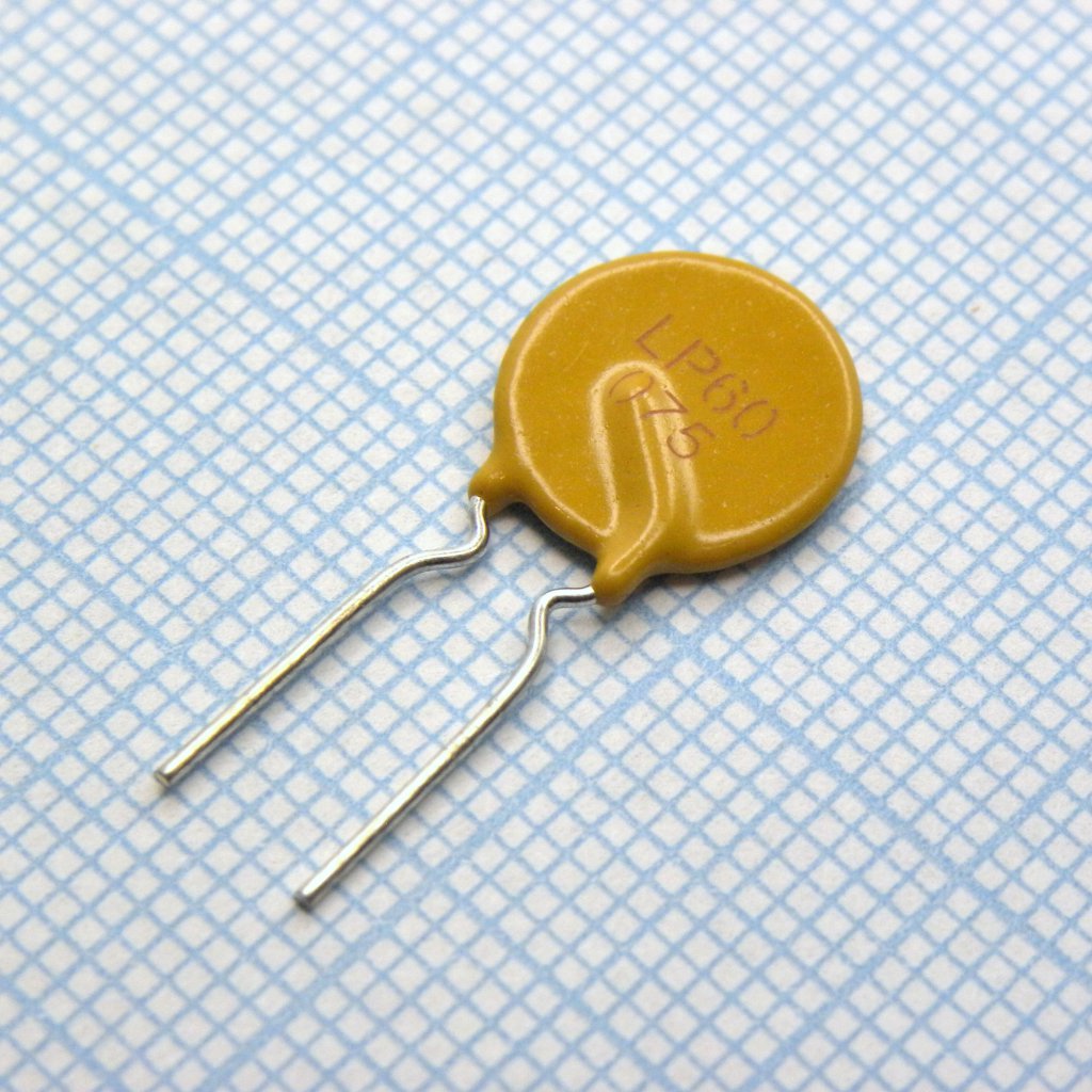 LP60-075F - Самовосстанавливающийся предохранитель PTC 0.75A(hold) 1.5A(trip) 60V 40A 0.95W 6.3s 0.18Ohm Radial 11 X 3.1mm, Bulk