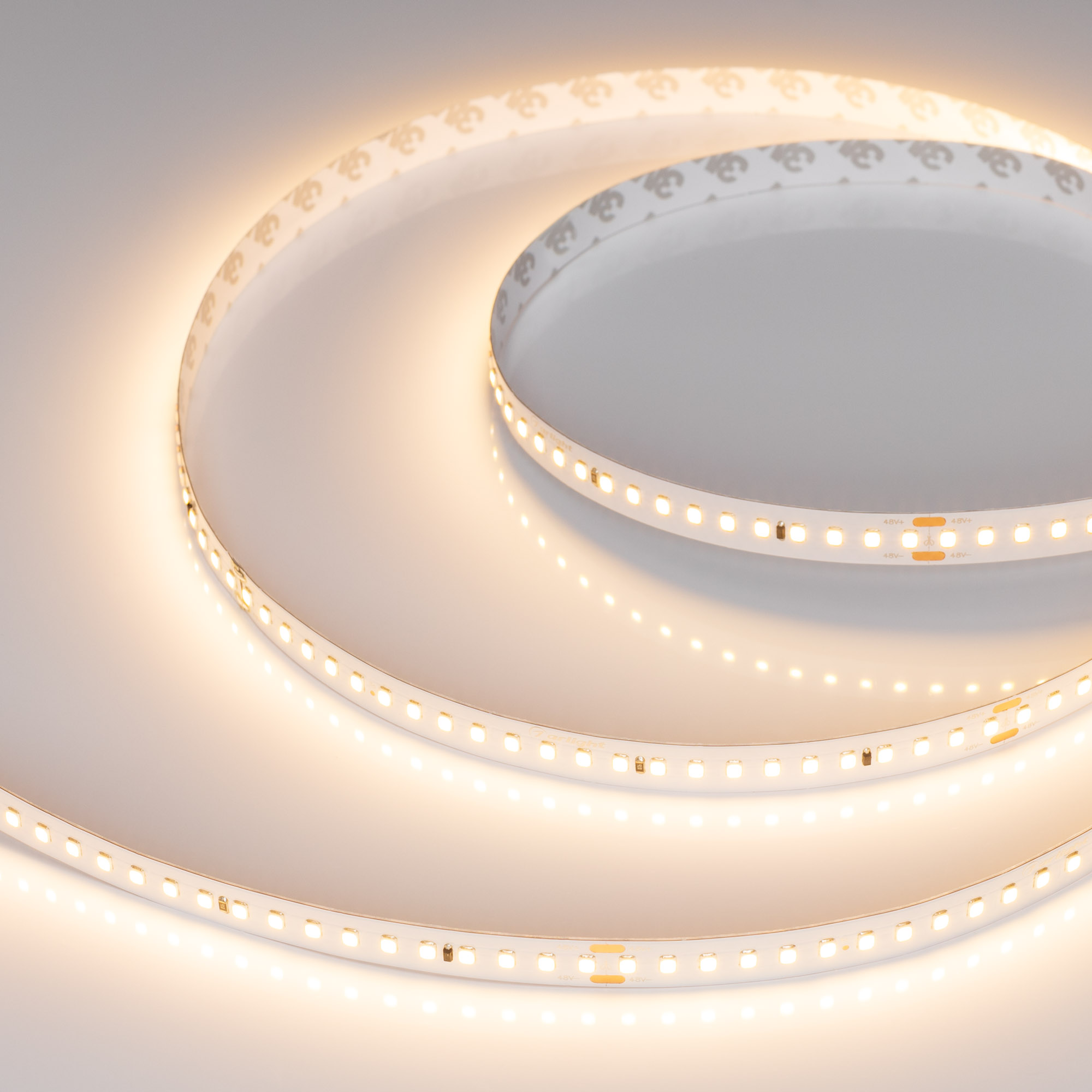 Лента IC-A144-12mm 48V Warm2700 (5.8 W/m, IP20, 2835, 50m) 026984(2) - Стабилизированная лента LUX, подключение 50м в одну линию, светодиоды smd 2835, 144шт/м (7200шт на 50м), белая плата 12мм, скотч 3М. Цвет ТЁПЛЫЙ 2700K. Питание 48V, мощность 5.8 Вт/м (