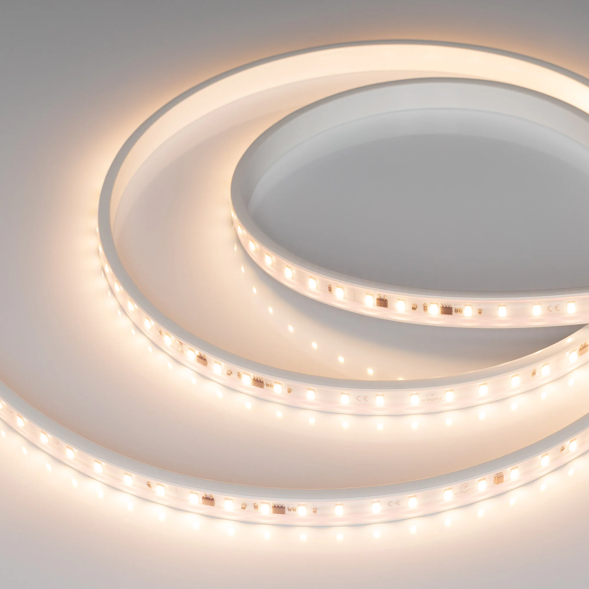 Лента герметичная ARL-PV-C72-15.5mm 230V Warm3000 (14 W/m, IP65, 5630, 50m) 027053(2) - Светодиодная лента AC230V (бобина 50м) ARL-PV-C72, герметичная IP65 (PV-трубка ПВХ экструзия). Светодиоды 5630, 72 шт/м (3600 шт на 50 м), белая плата, ширина 15.5 мм.