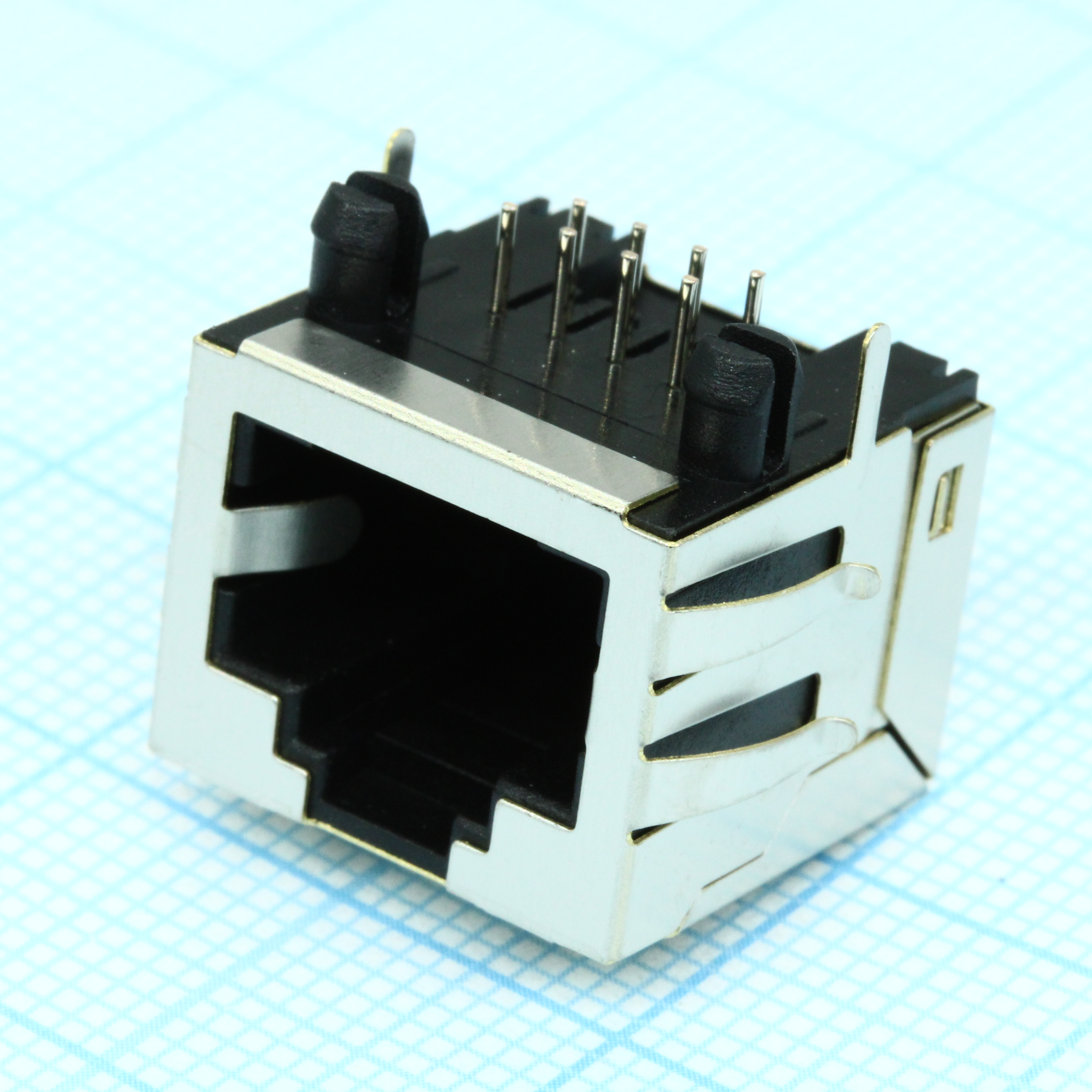 TRJE101CNL - Разъем экран. "гнездо" RJ-45, без светодиодов, с лепестками, от - 40 до + 85 гр.C, прямой угол на плату, Lкорп. = 15.8мм