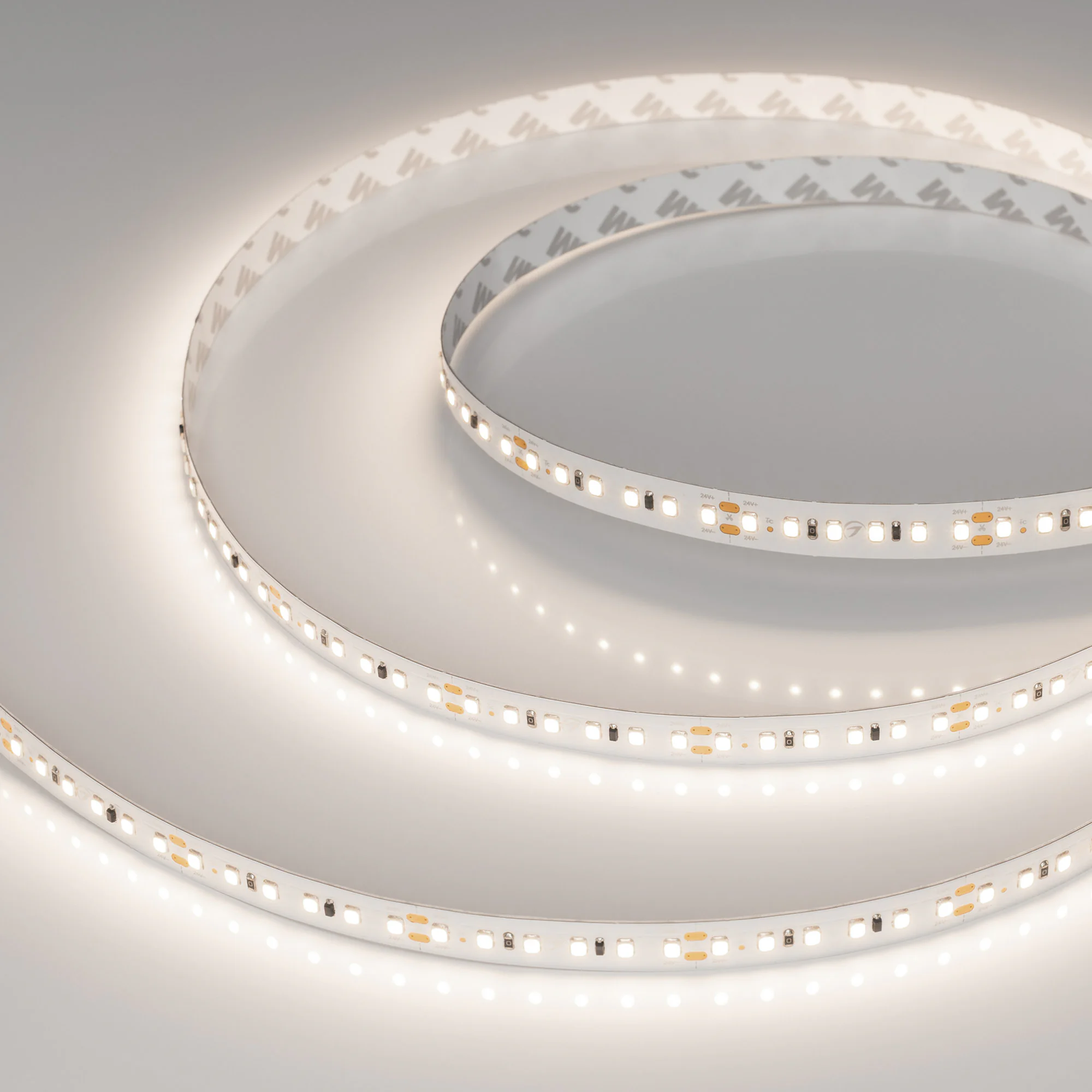 Лента IC-A120-12mm 24V Day4000 (9.6 W/m, IP20, 2835, 20m) 024591(2) - Светодиодная лента IC-A120, открытая. Светодиоды 2835, 120 шт/м (2400 шт на 20 м), белая плата, ширина 12 мм, скотч 3M. Цвет ДНЕВНОЙ 4000 K, цветопередача CRI>85, угол 120°. Питание 24V