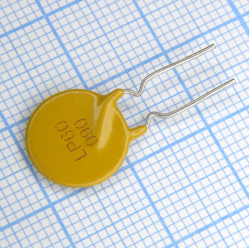 LP60-090F - Самовосстанавливающийся предохранитель PTC 0.9A(hold) 1.8A(trip) 60V 40A 1W 7.2s 0.14Ohm Radial 12 X 3.1mm, Bulk