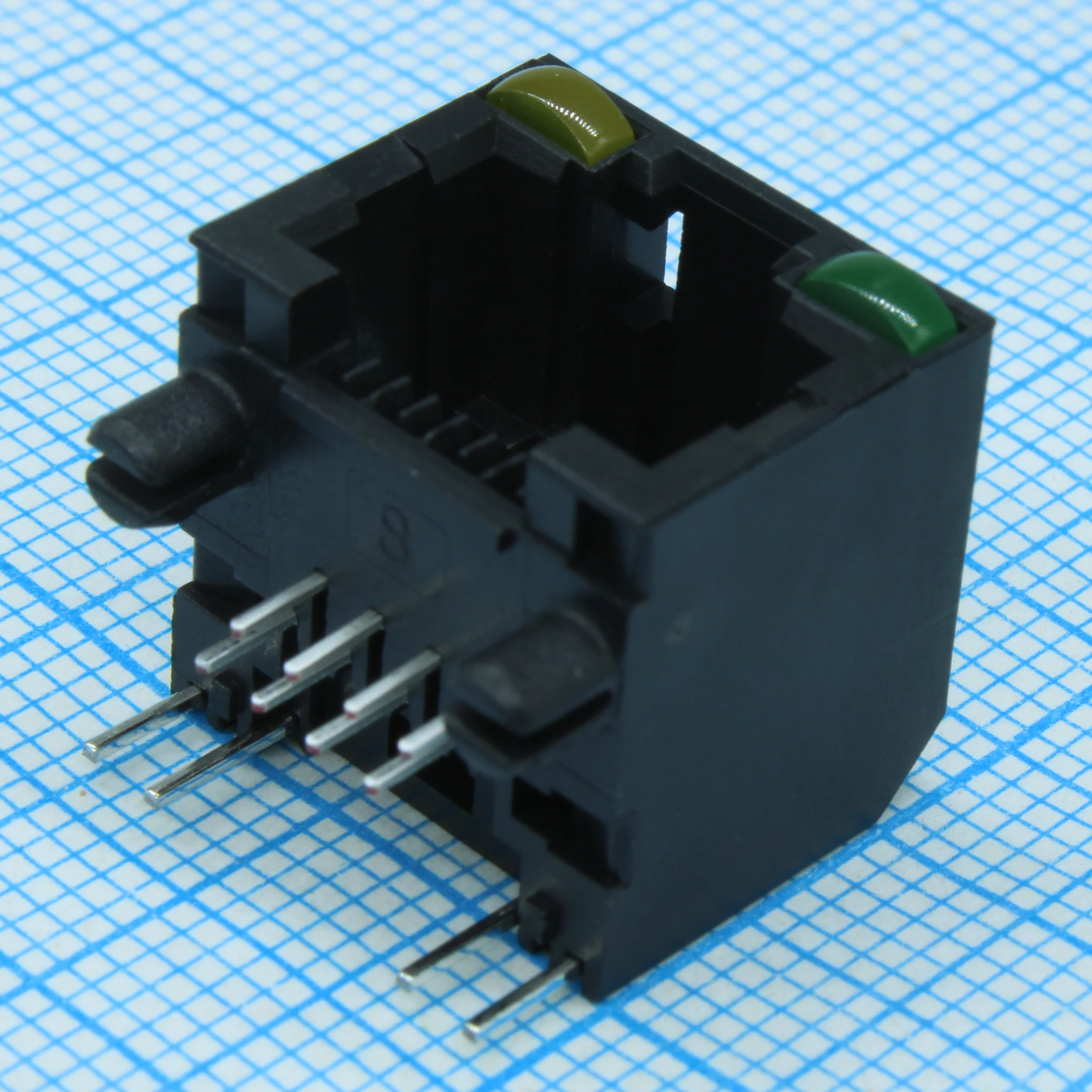 RJHSE-5081 - Разъем RJ-45 розетка 8 контактов шаг 1.02мм угловой монтаж в отверстие 12 терминалов 1 порт