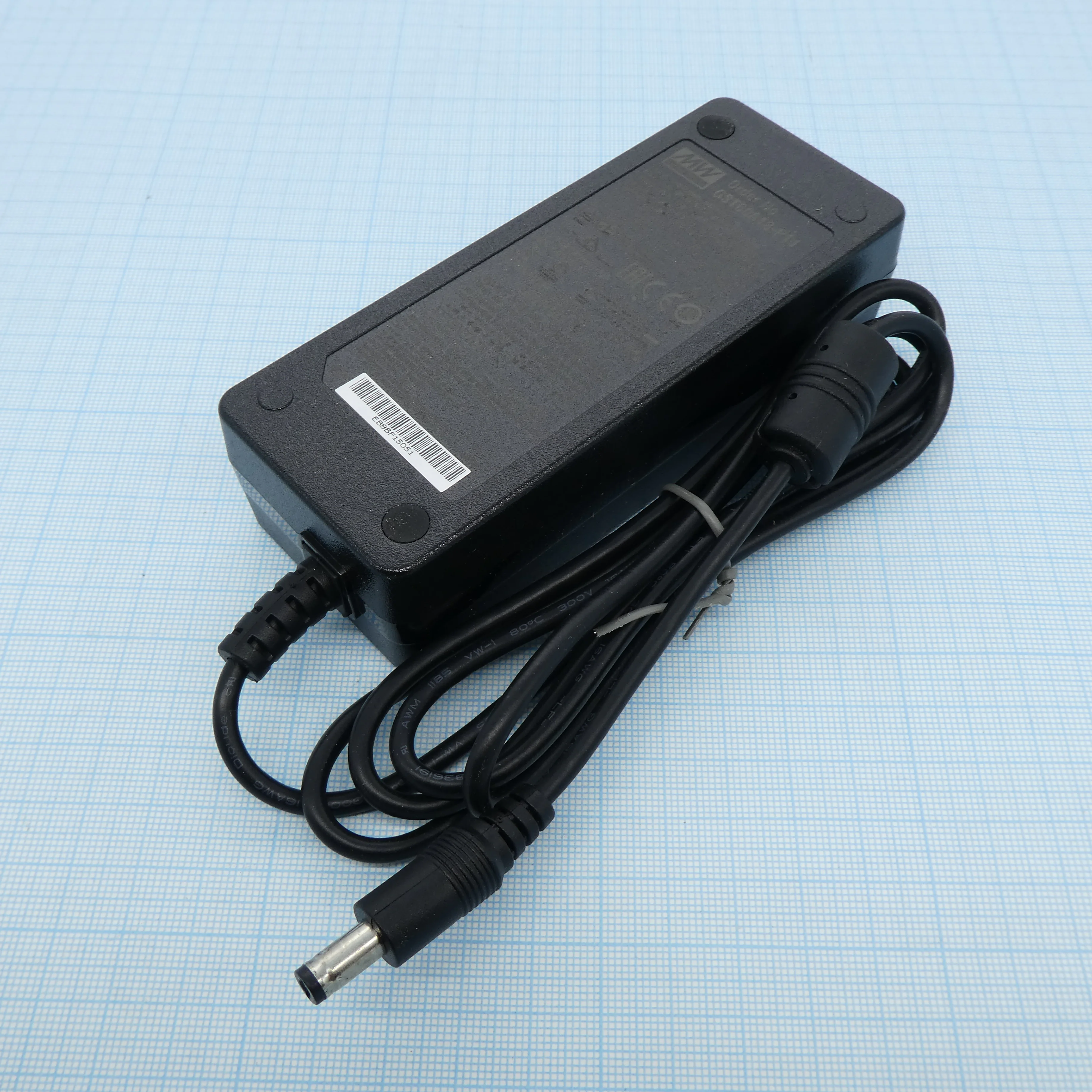 GST60A18-P1J - AC-DC, 60Вт, вход 90...264B AC, 47...63 Гц, 127...370B DC, выход 18B/3.33A, изоляция 3000В AC, 125x50x31.5мм, -30...+70°С, сетевой разъём IEC320-C14, выходной разъем 11, диам. 5.5х2.1мм
