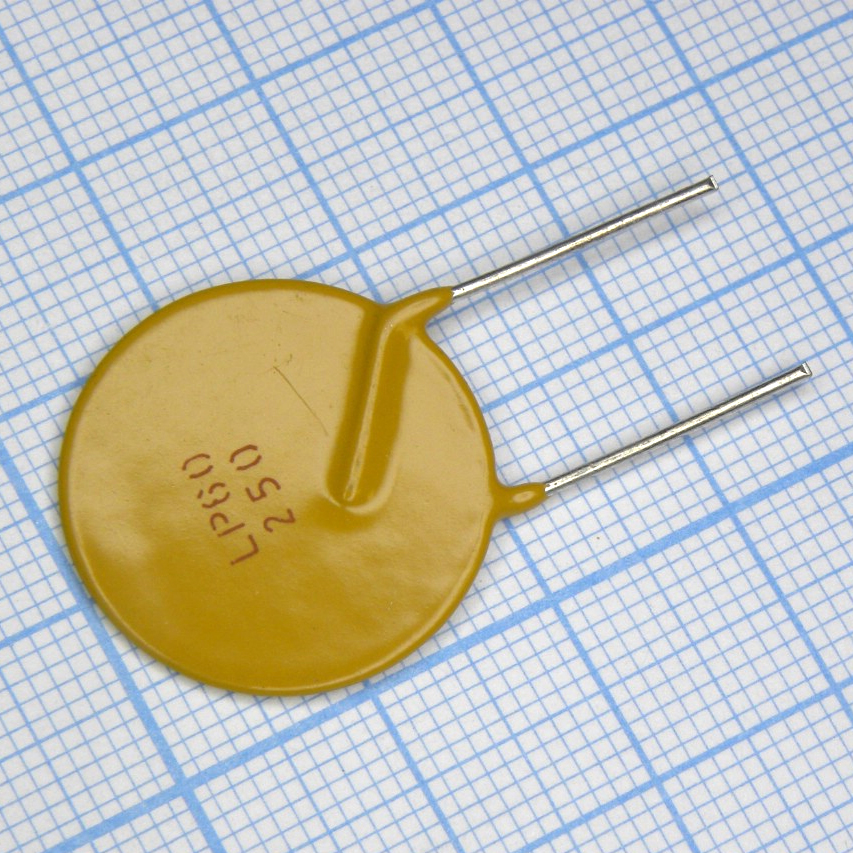 LP60-250F - Самовосстанавливающийся предохранитель PTC 2.5A(hold) 5A(trip) 60V 40A 2.5W 15.6s 0.05Ohm Radial 21.5 X 3.1mm, Bulk