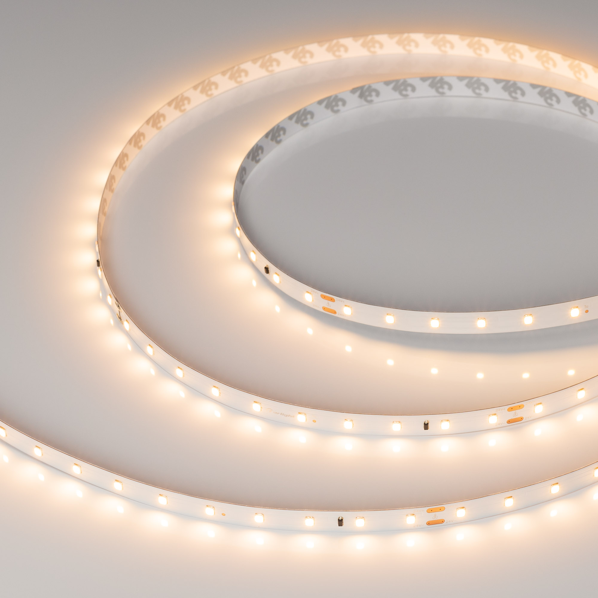 Лента IC-A60-10mm 24V Warm2700 (4.8 W/m, IP20, 3528, 20m) 025013(2) - Стабилизированная лента 20 метров, светодиоды smd 3528, 60шт/м (1200шт на 20м), белая плата 10мм, скотч 3М. Цвет ТЁПЛЫЙ 2600-2800K. Питание 24V, мощность 4.8 Вт/м (96 Вт на 20м), угол 1