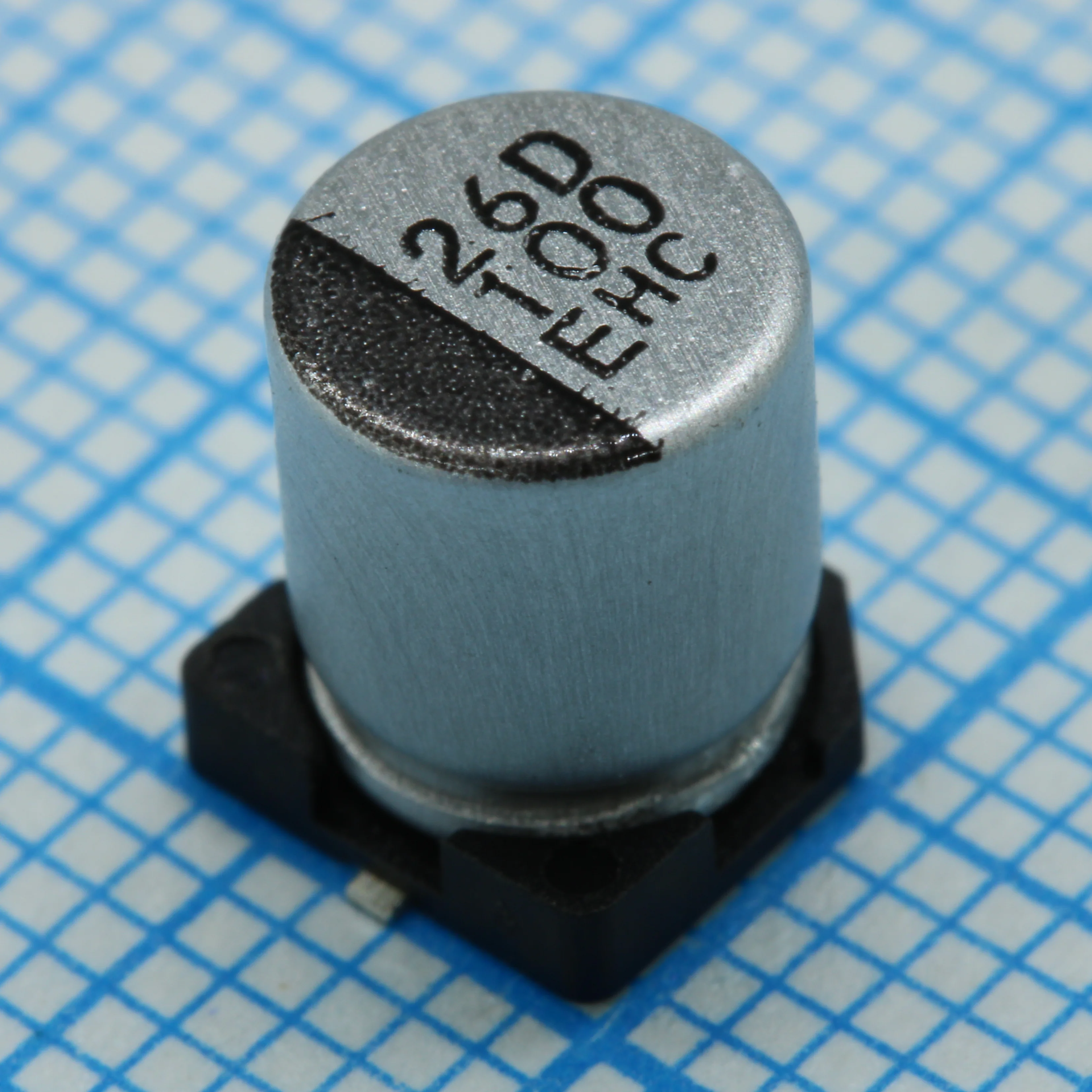 HHXC250ARA101MF80G - Полимерный гибридный алюминиевый конденсатор 100мкФ 25В ±20%( 6.3 X 7.7мм) для поверностного монтажа 0.03Ом 1400мА 4000час 125°C лента на катушке