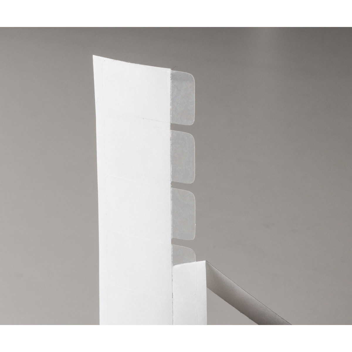 brd16103 - LAM-5-103 ламинационные этикетки, полиэстер B-103, цвет-прозрачный, размер 25,4х12,70мм, 2000 шт/рул.