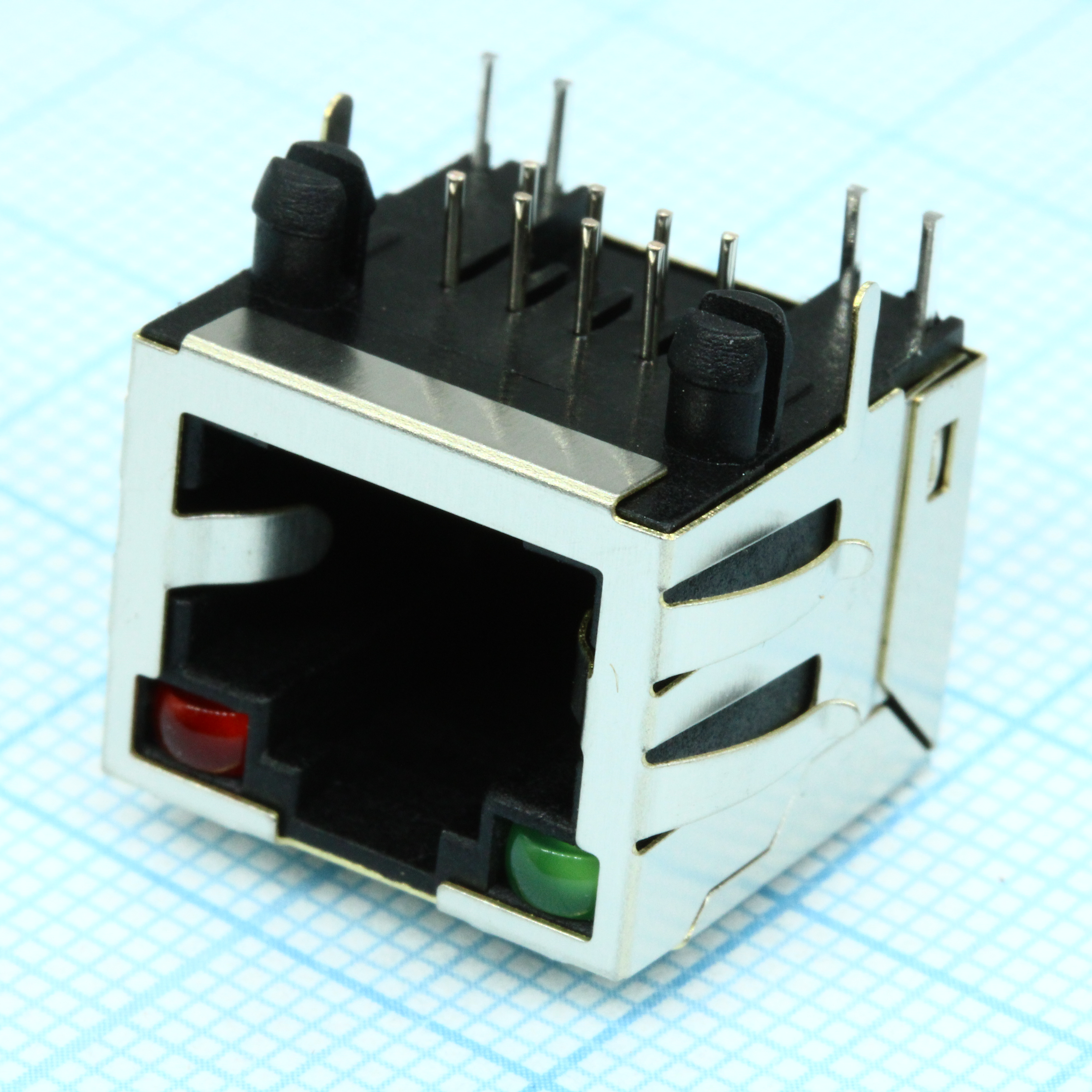TRJE101A33NL - Разъем экран. "гнездо" RJ-45, 2 верхн. светодиод. (лев. зеленый/ прав. красный), с лепестк., от - 40 до + 85 гр.C, пр.угол на плату, Lк. = 15.8мм  (аналог TJ18-L8P8C-5* Lк. = 15.8мм)