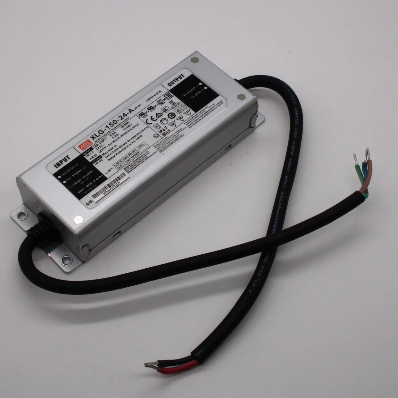 XLG-150-24-A - AC-DC, 150Вт, IP67, вход 90…305В AC, 47…63Гц, ККМ, выход 6.25А/16.8…24В, изоляция 3750В AC, в кожухе 180х63х35.5мм, -40…+90°С (корпус), встр. потенциометр