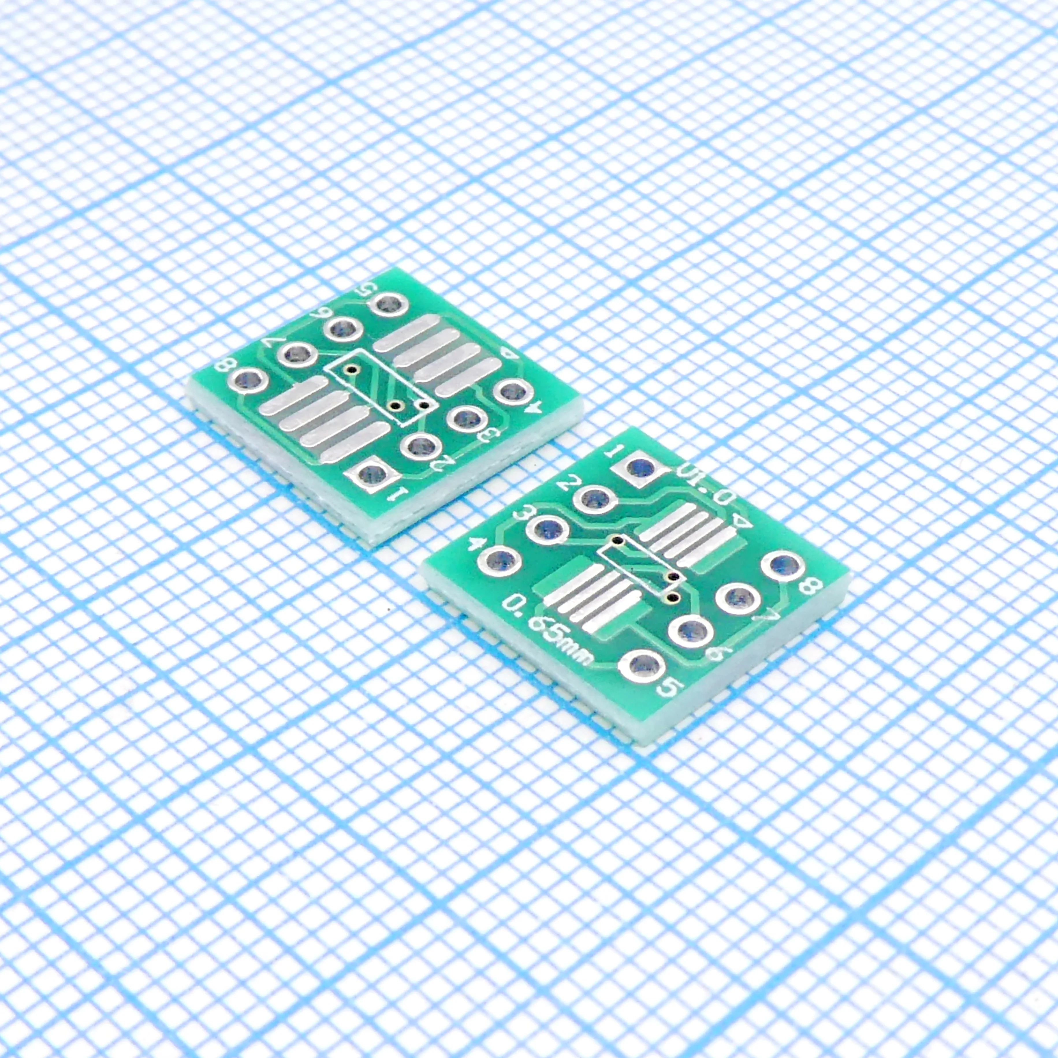 Плата SOIC-8 и SSOP-8 - Двухсторонняя плата с разводкой под SMD-корпуса SOIC-8 (150, 208 и 300 mil) и SSOP-8. С помощью ее можно с легкостью изготовить переходник на корпус DIP-8 с шагом 2,54 мм