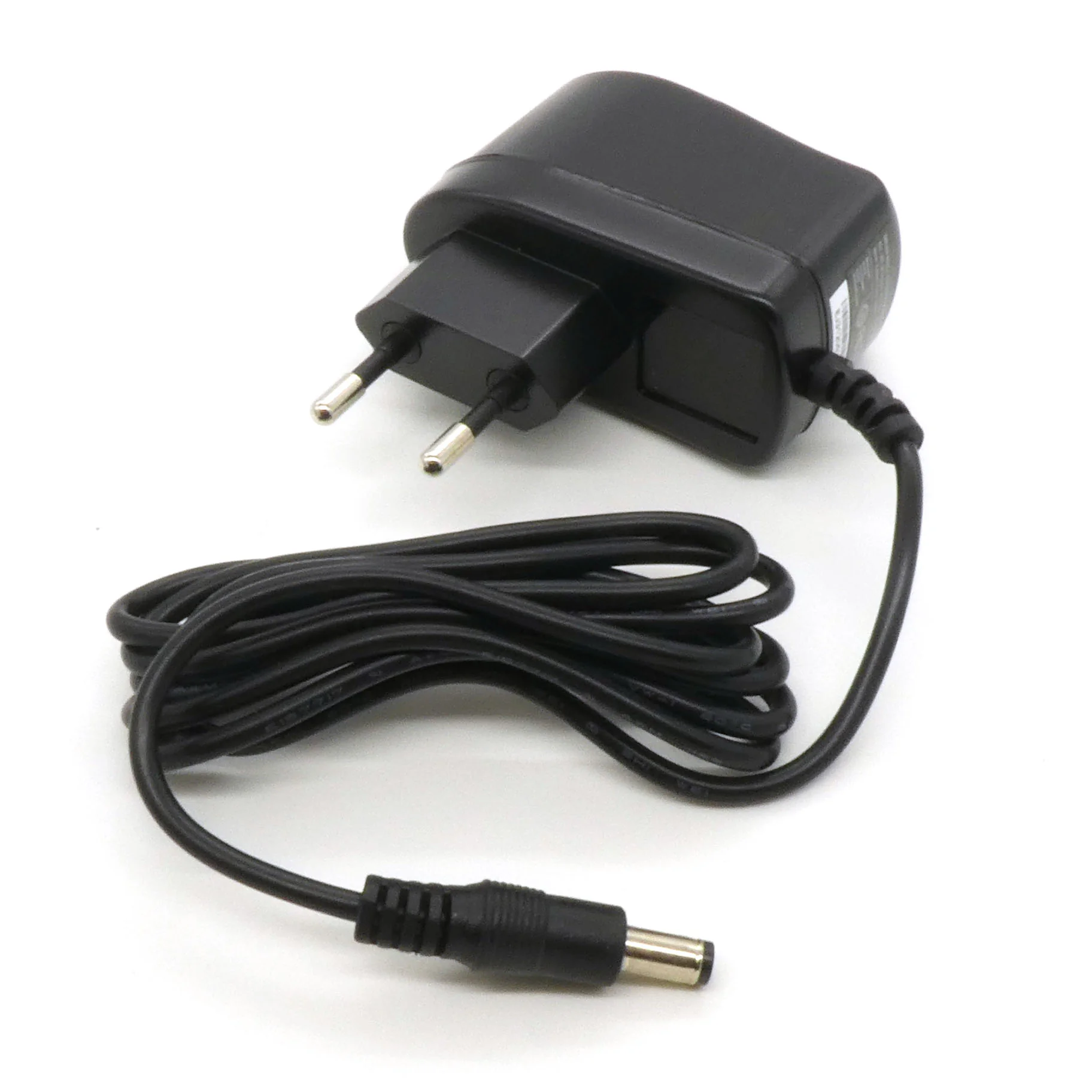 GS06E-2P1J - AC-DC,  6Вт, сетевой адаптер, выход 9В/0.66А, вход 90...264В AC, 47...63 Гц, 135...370B DC,  изоляция 3000B AC, 32x66x42.5мм, 0...+50°С, евровилка