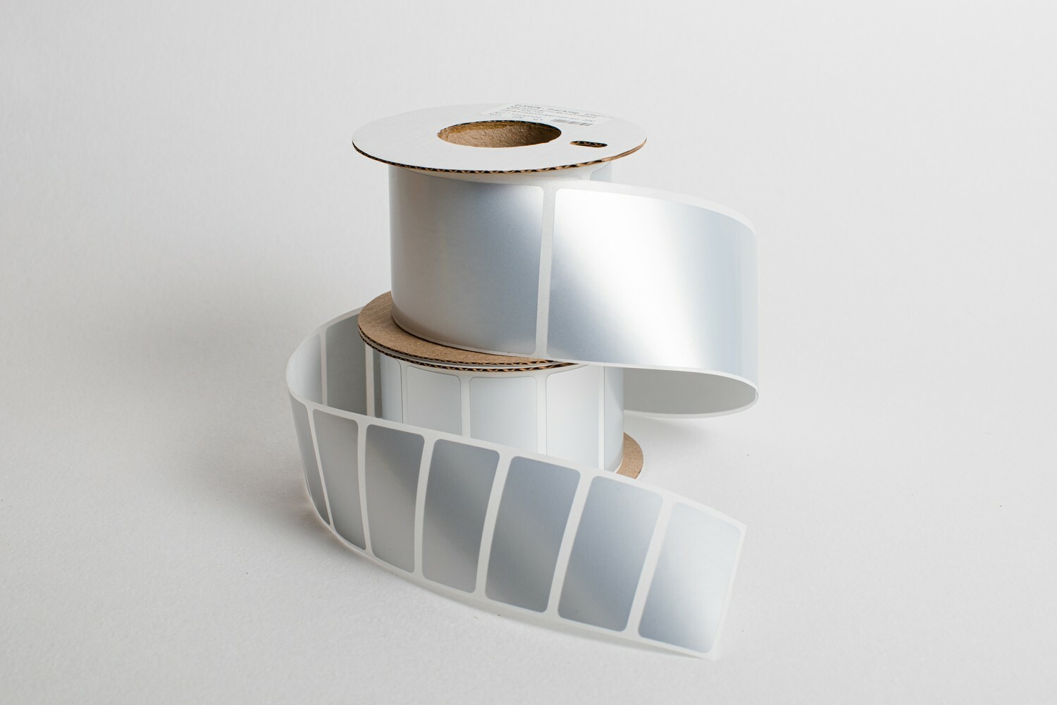 Металлизированная наклейка NPT-50х100 - Наклейка, для изготовления шильдов, обозначения светосигнальной арматуры, кнопок и переключателей, размер 50х100 мм, цвет матовый алюминий, для принтера: RT200, RT230, в упаковке 200 наклеек