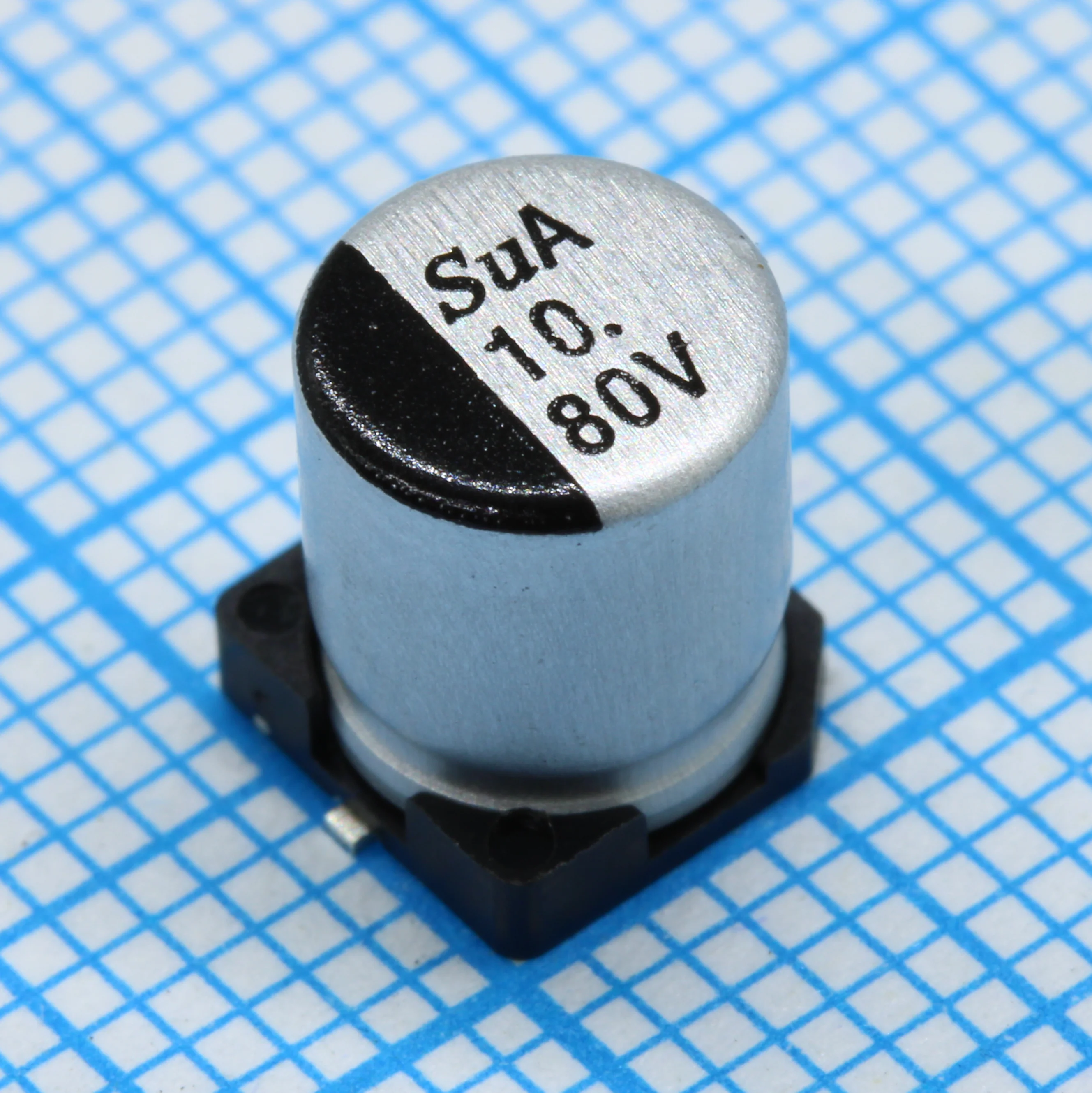 TS13CA1K100MGT000R - SMD Конденсатор алюминиевый электролитический 80В, 10мкФ ±20%, размер 6.3 X 7.7мм, 2.4 Ом, 60мА, 3000ч, 105С