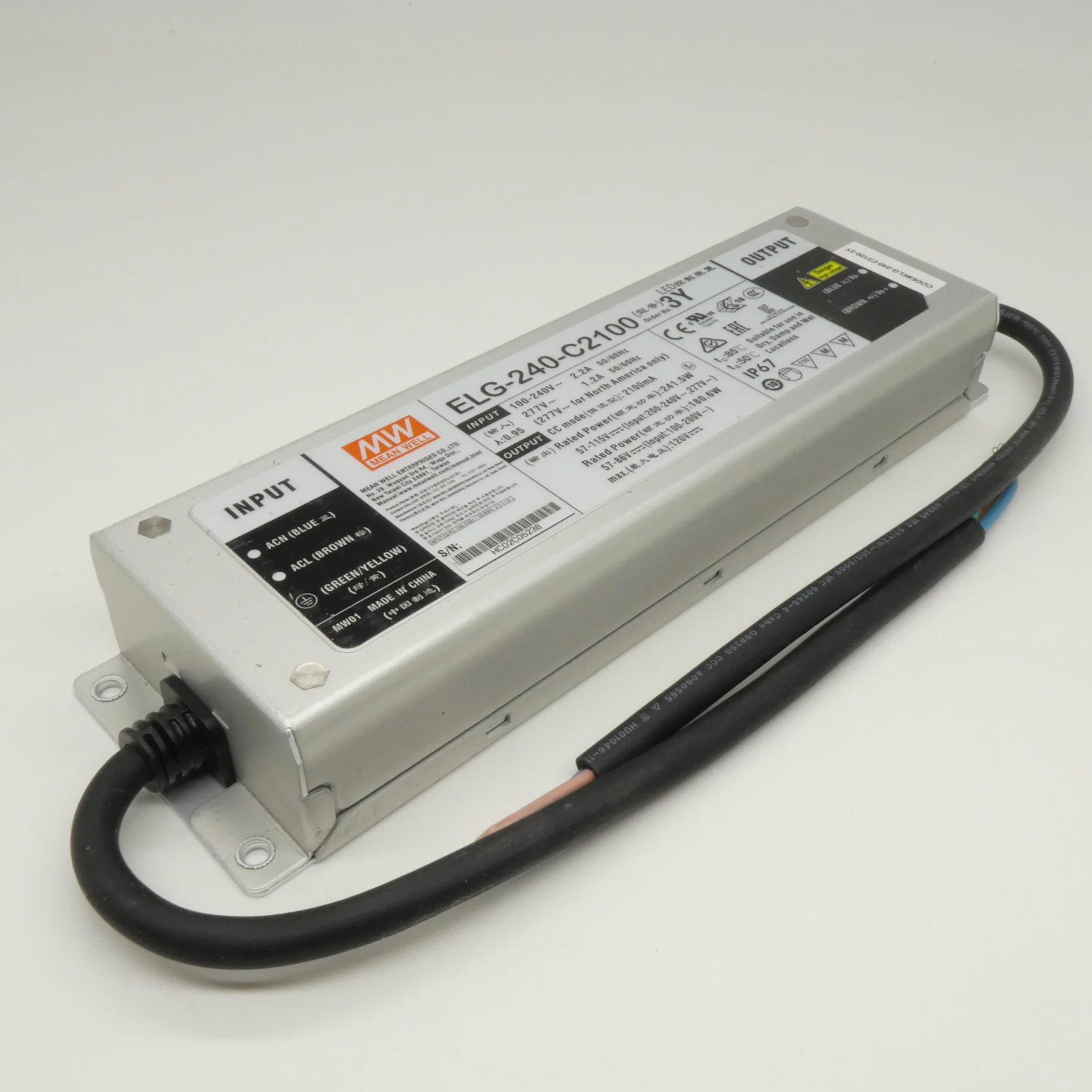 ELG-240-C2100-3Y - AC-DC, 241.5Вт, IP67, вход 100…305В AC, 47…63Гц/142…431В DC, ККМ, выход 57...115В/2100мА, изоляция 3750В AC, в кожухе 244х71х37.5, -40…+85°С (корпус), с проводом заземления