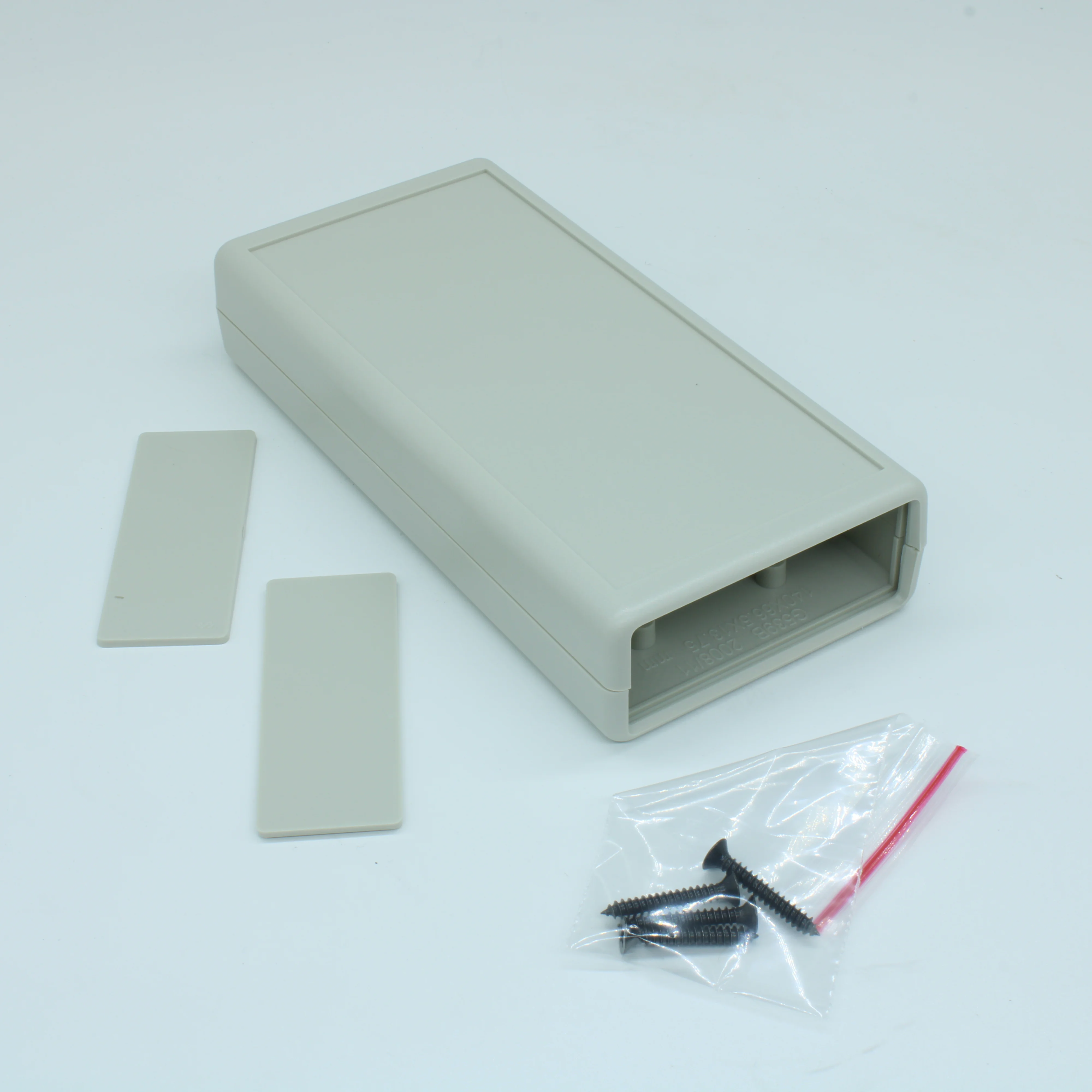 G539G-2$ - Корпус приборный, носимый, материал: ударопрочный пластик ABS, две панели "$", серый
