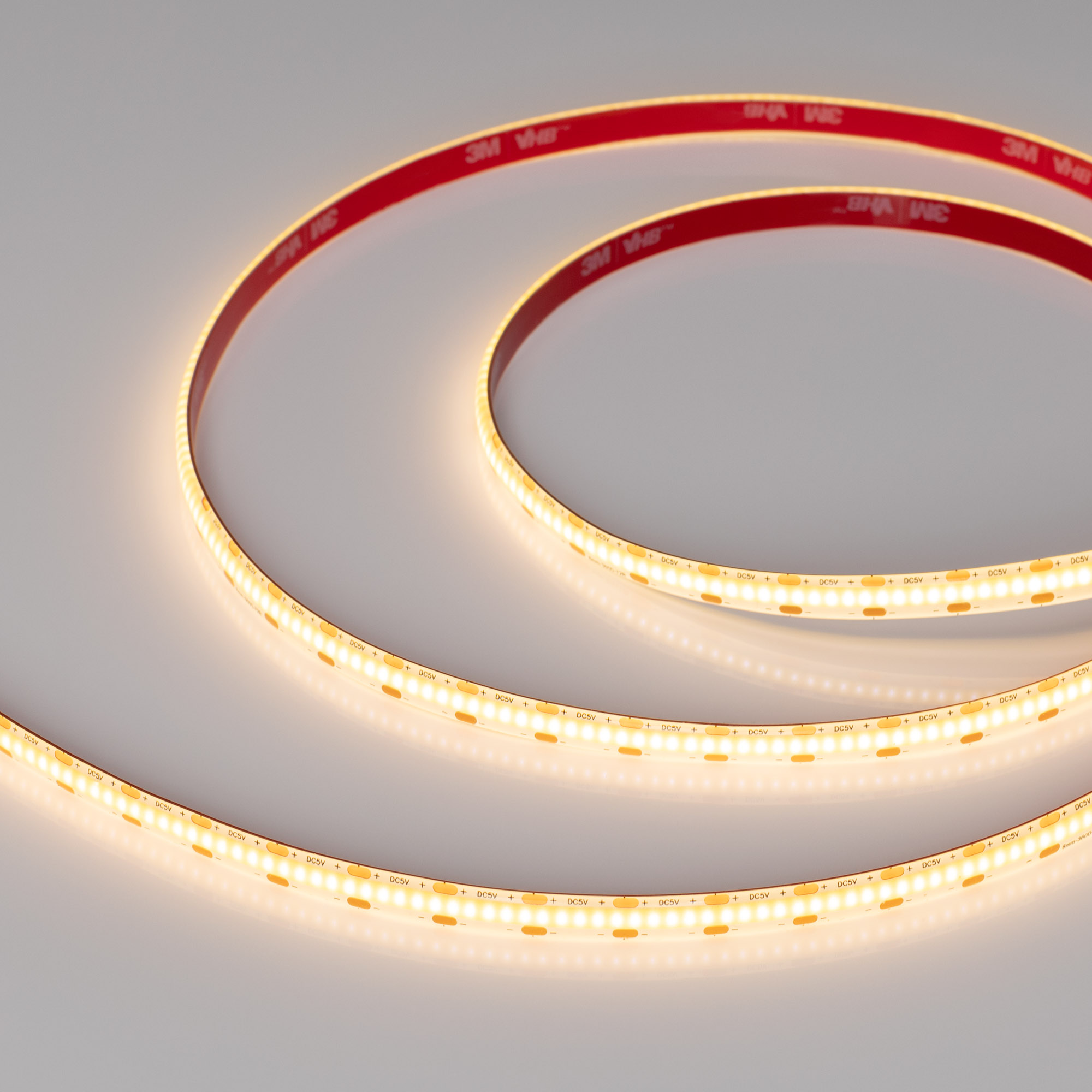 Лента герметичная COB-SE-X360-8mm 5V Warm2700 (5 W/m, IP65, CSP, 5m) 041710 - Лента COB сплошной засветки без видимых светодиодов, IP65 (SE - силиконовое покрытие). Светодиодов CSP 360 шт/м. Цвет свечения ТЕПЛЫЙ 2700K, высокий индекс цветопередачи CRI>90,