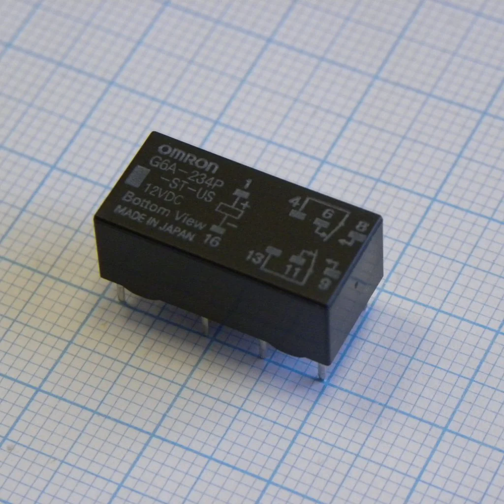 G6A-234P-ST-US-12VDC - Сигнальное реле 2А две контактных группы на переключение катушка 12В  (20.2х10.1х8.4)мм монтаж в отверстие