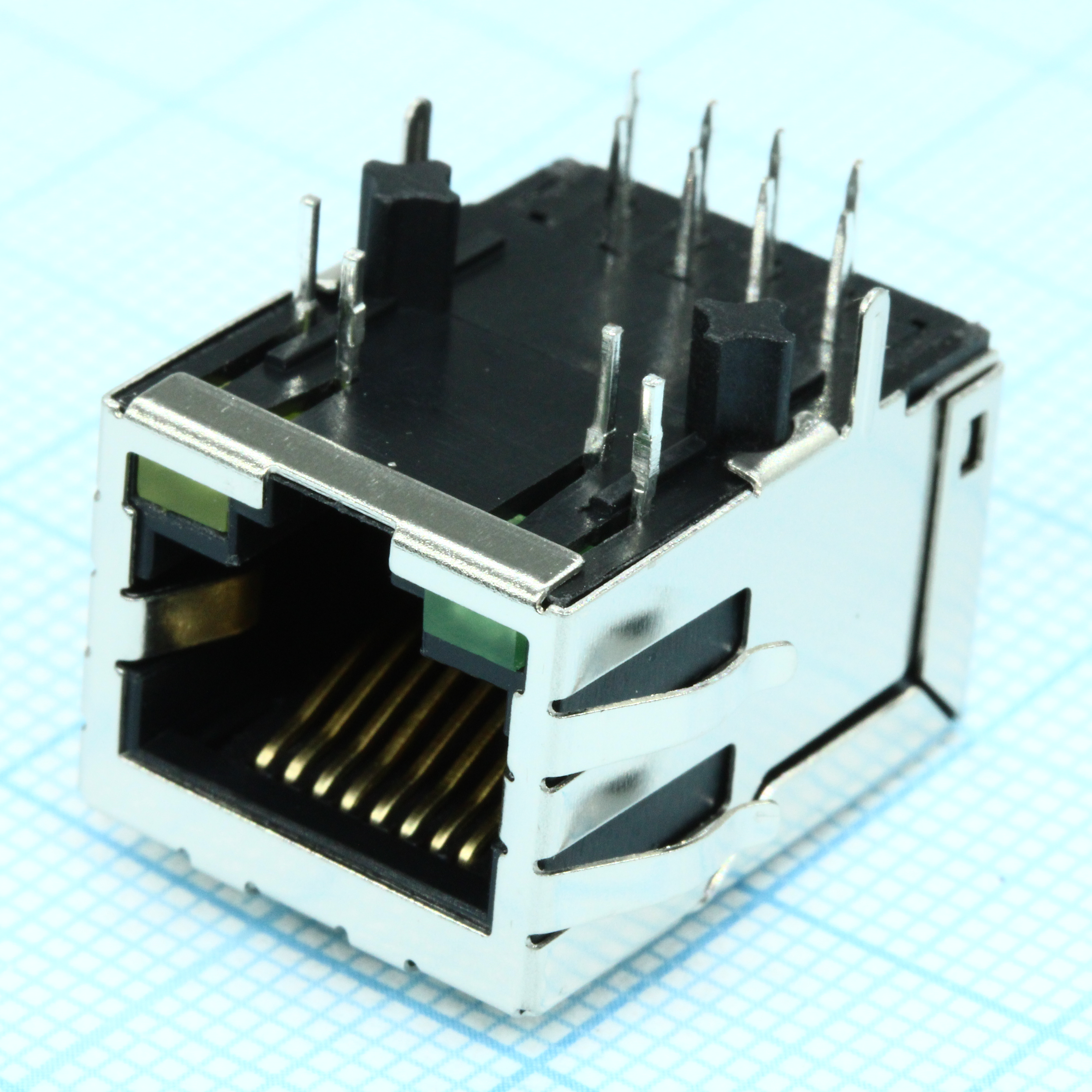 TRJ4026ABNL - Разъем экр. "гнездо" RJ-45 c согласующ. фильтром 10/100Base-TX (1:1), 2 нижн. светодиод. (лев.зел./прав.желт.), с лепестк., от - 40 до + 85 гр.C, пр. угол на плату, Lк. = 21.3 мм (аналог J0026D21BNL*/ LU1T516-43*)