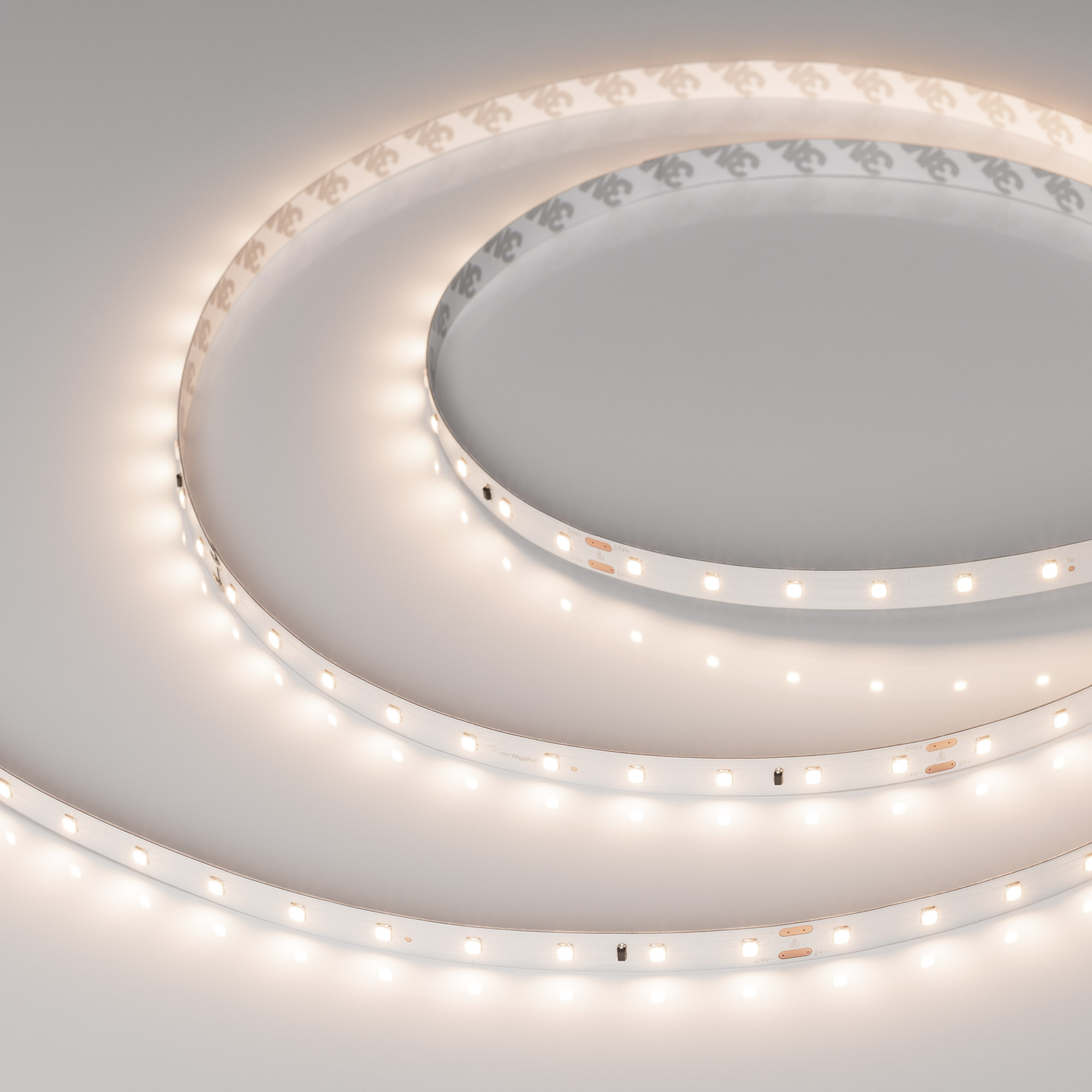 Лента IC-A60-10mm 24V Warm3500 (4.6 W/m, IP20, 2835, 30m) 028626(2) - Стабилизированная лента LUX, подключение 30м в одну линию, светодиоды smd 2835, 60шт/м (1800шт на 30м), белая плата 10мм, скотч 3М. Цвет ТЁПЛЫЙ 3500K. Питание 24V, мощность 4.6 Вт/м (13