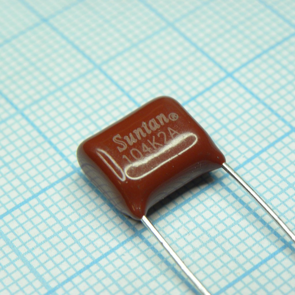 TS02002A104KSB0D0R - Конденсатор металлоплёночный полиэтилентерефталатный 0.1мкФ 100В ±10% (13х7х10мм) шаг выводов 10мм 85°С россыпь