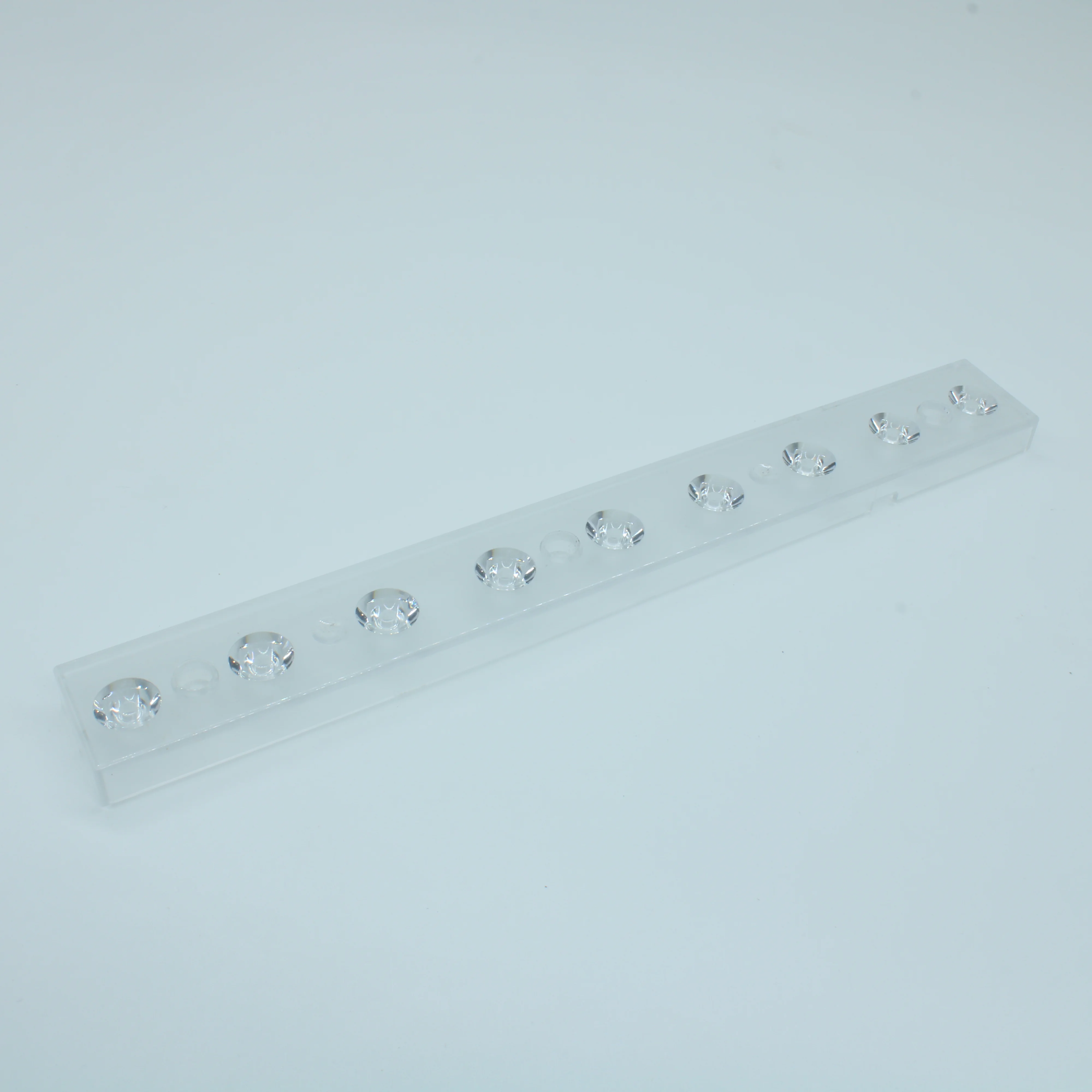 ASL239D9LED15G - Групповая линейная линза на 9 светоточки для светодиодов 3030/3535, 93%, 15°. 9X1, 239mm H:29mm, PMMA