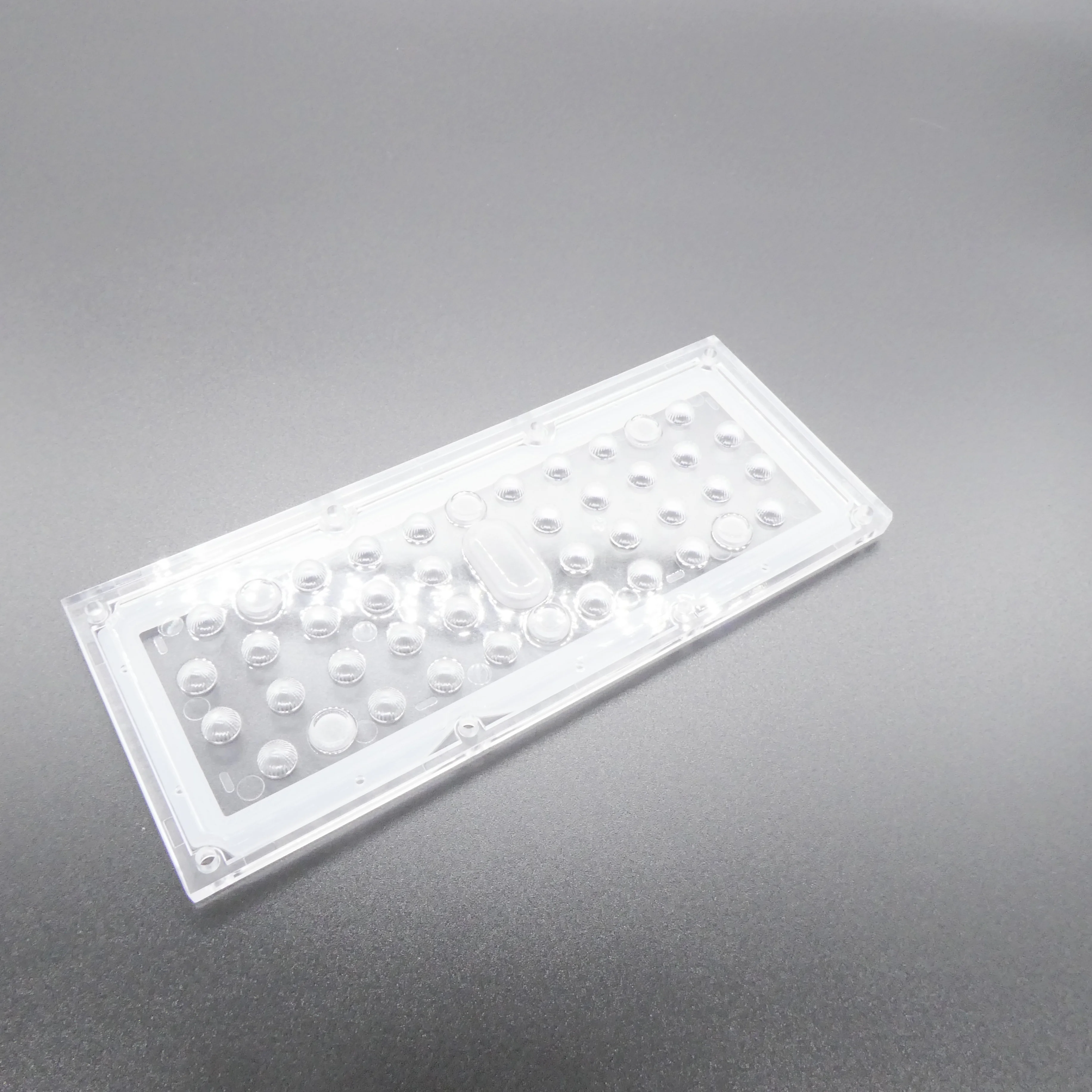 ALHB173D36LED60G - Групповая прямоугольная линза 36 светодиодов 3030/3535,  60°, 173x71.4mm   H:9.3mm, PMMA