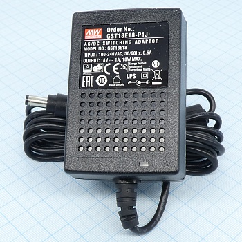 GST18E18-P1J - AC-DC, 18Вт, вход 85...264B AC 47...63 Гц,, выход 18B/1A, изоляция 3000В AC, 79x54x33мм, -30...+70°С, выходной разъем 11, диам. 5.5х2.1мм