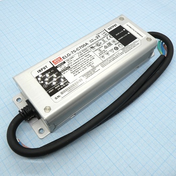 ELG-75-C700A-3Y - AC-DC, 74.9Вт, IP65, вход 100…305В AC, 47…63Гц/142…431В DC, ККМ, выход 53…107В/700мА, изоляция 3750В AC, в кожухе 180х63х35.5, -40…+85°С (корпус), рег. выхода, с проводом заземления
