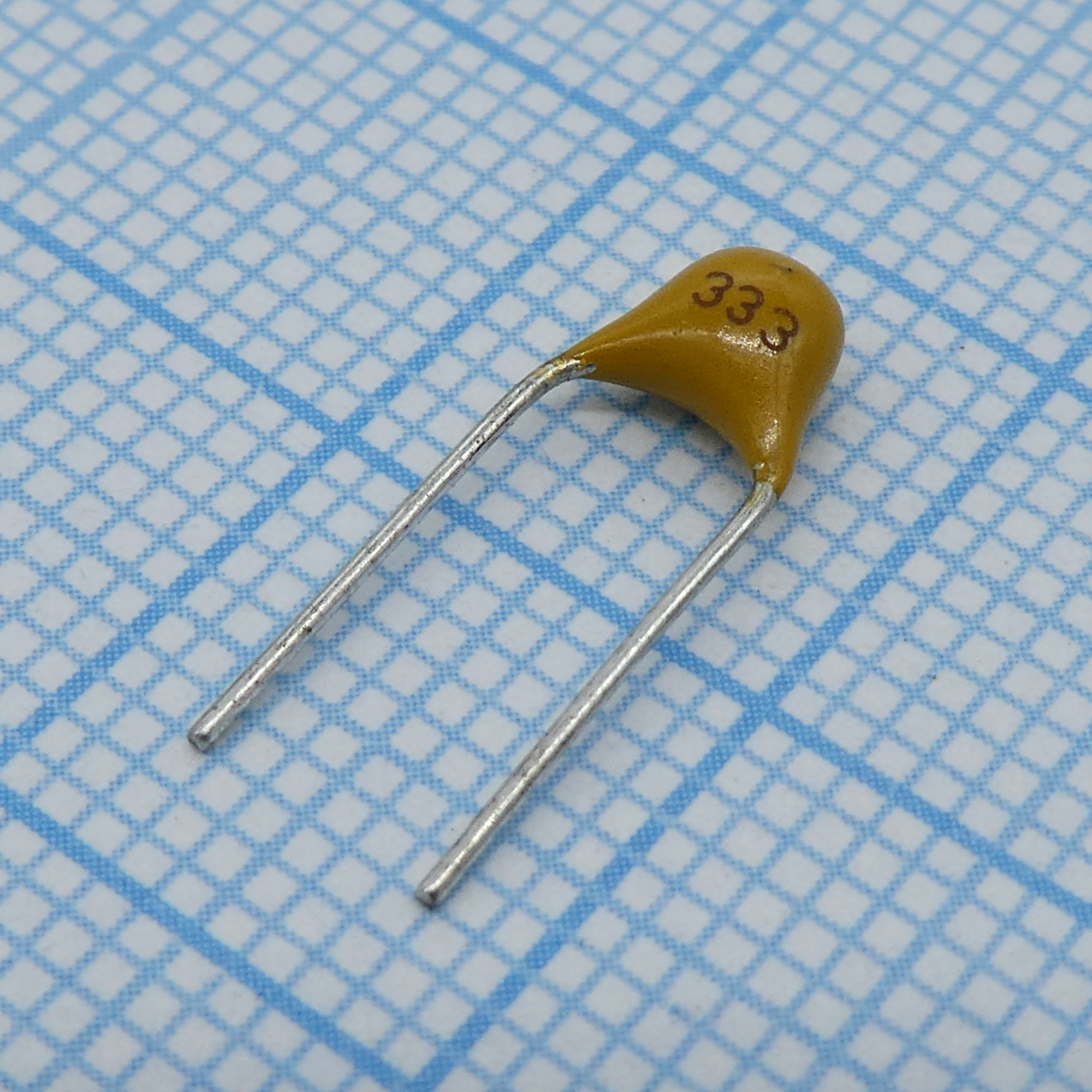 TS170R1H333MSBFB0R - Конденсатор керамический многослойный 0.033мкФ 50В Y5V ±20% радиальный 5.08мм 85°C россыпь