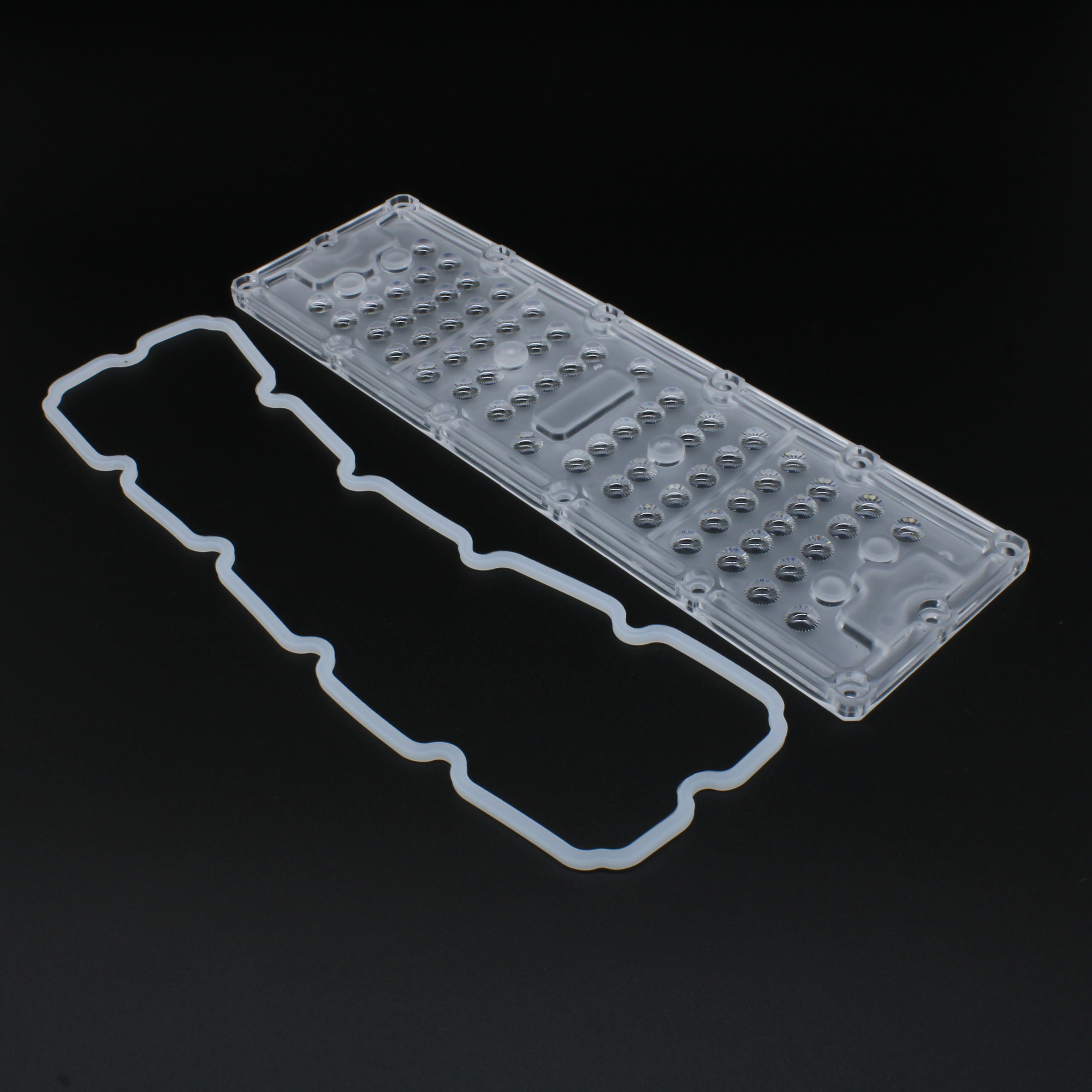 AJHB236D64LED60G - Групповая прямоугольная линза на 64 светодиода 3030/2835, эфф=90%, диаграмма 60°, 236x70mm   H:7,1mm, PC-1250Z