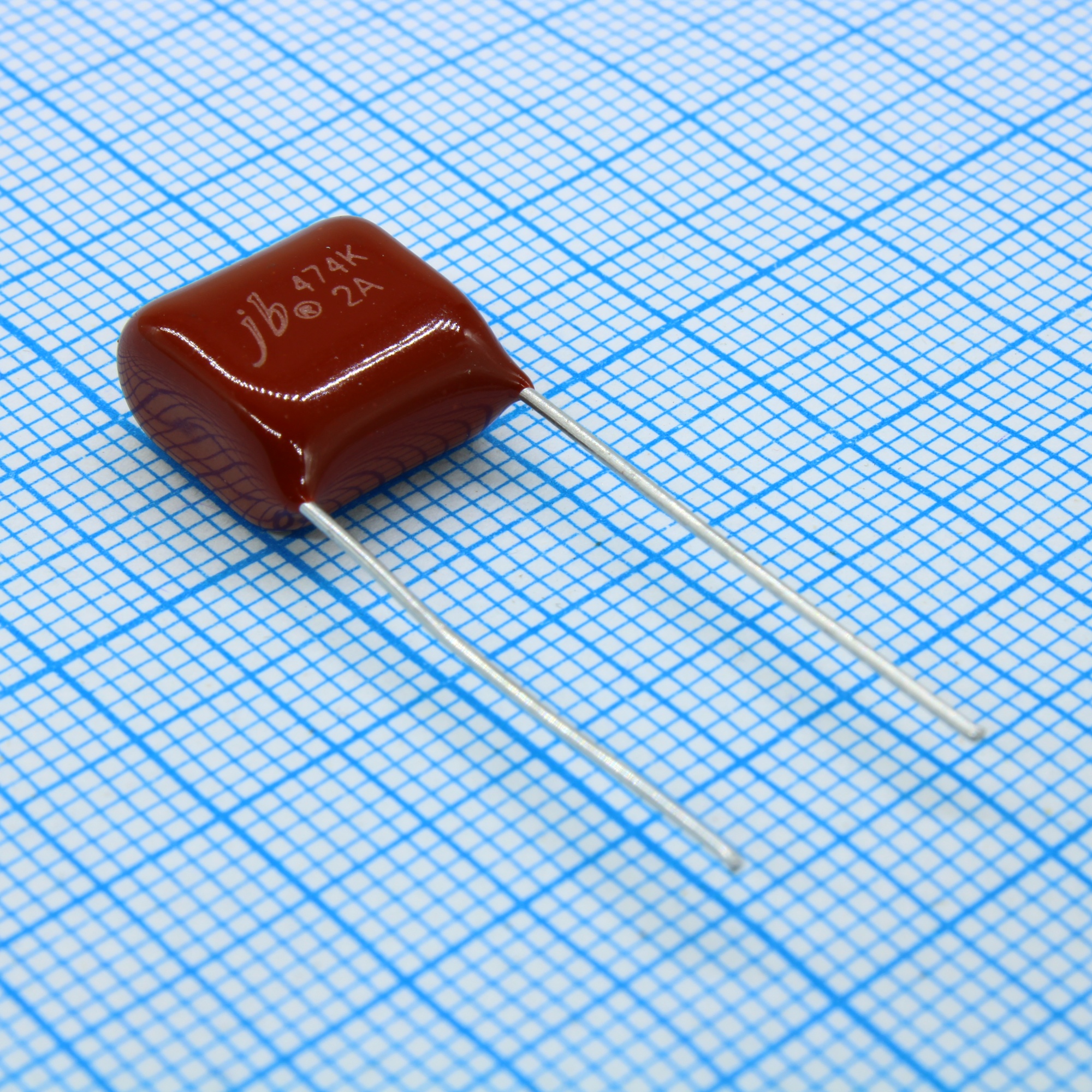 JFB02A474K100000B - Конденсатор металлоплёночный полиэтилентерефталатный 0.47мкФ 100В ±10% (14х8х114мм) шаг выводов 10мм 85°С россыпь