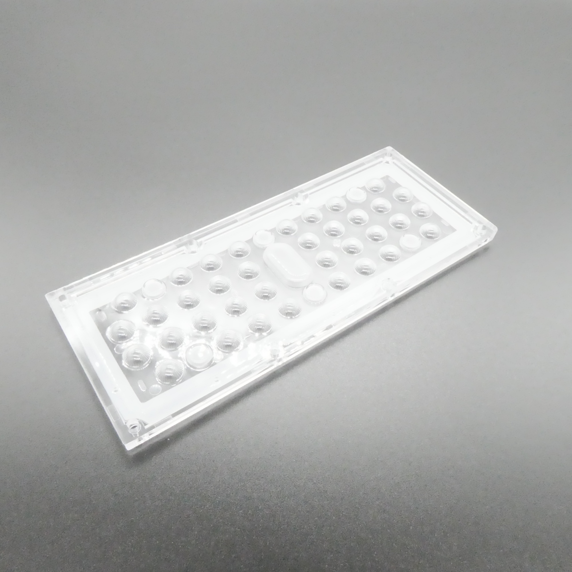 ALHB173D36LED90G - Групповая прямоугольная линза 36 светодиодов 3030/3535,  90°, 173x71.4mm   H:9.3mm, PMMA