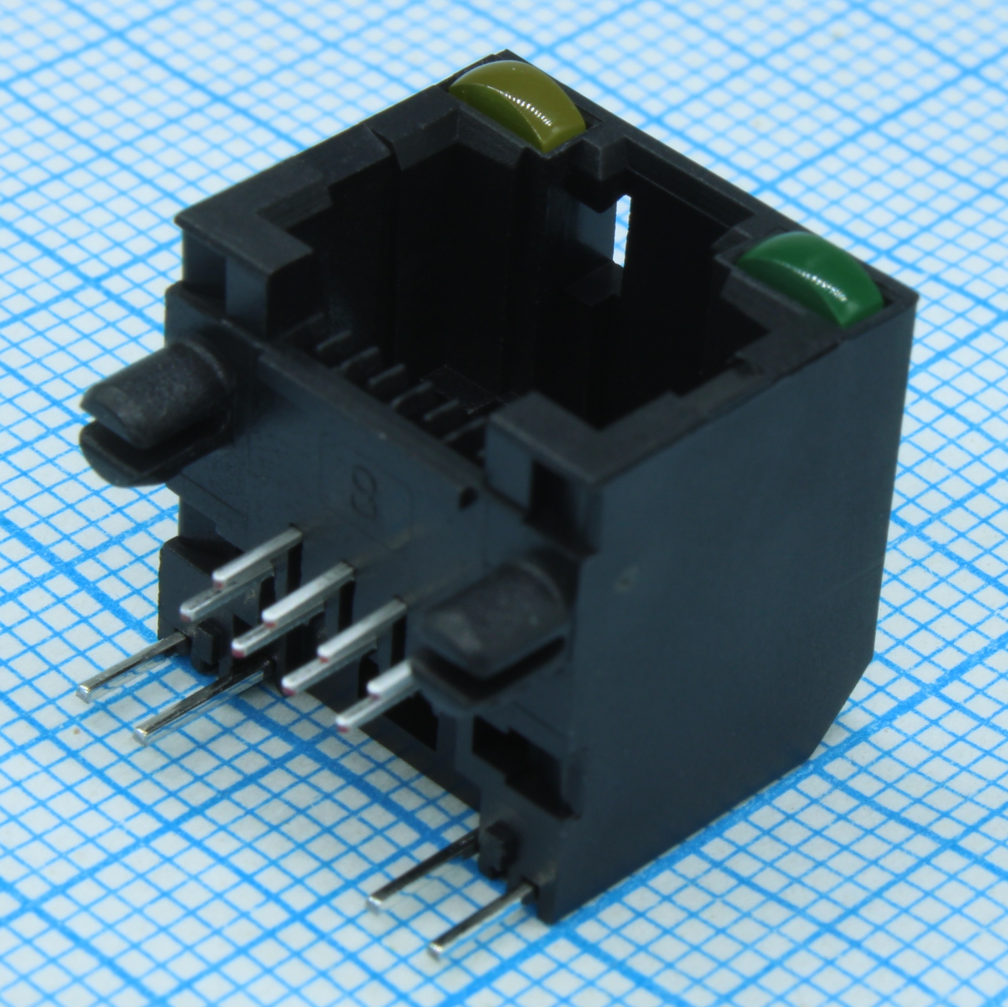 RJHSE-5081 - Разъем RJ-45 розетка 8 контактов шаг 1.02мм угловой монтаж в отверстие 12 терминалов 1 порт