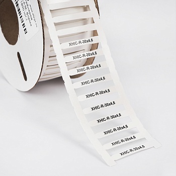 Маркер для контейнеров XHIC-R-30-4,6x0,4-W - Маркер для конейнеров CHL, STC, DMP, форма маркера: усечённый ромб, высота 4,6 мм, длина 30 мм, цвет белый, для принтера: RT200, RT230, в упаковке 900 маркеров