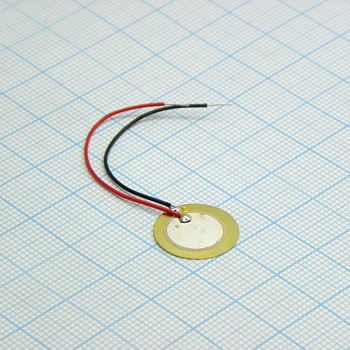 FML-15T-7.9A1-50 - Пьезо-элемент 7.9kHz  Cсоб=14nf  D=15.0  t=0.3 длина выводов 50мм