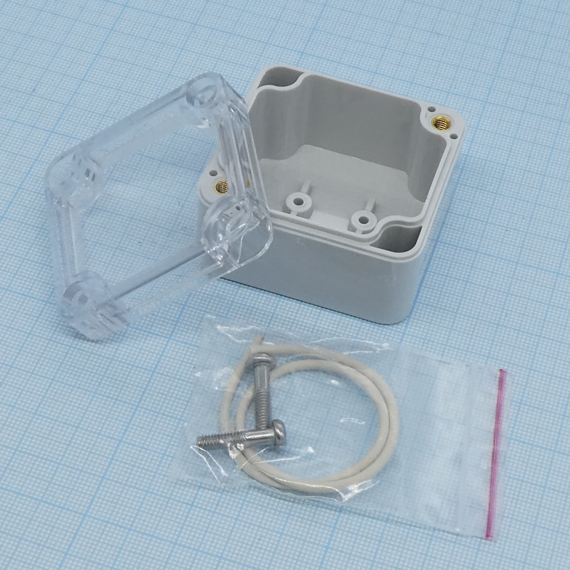 G250C - Герметичный корпус из поликарбоната с прозрачной крышкой, IP65, светло-серый