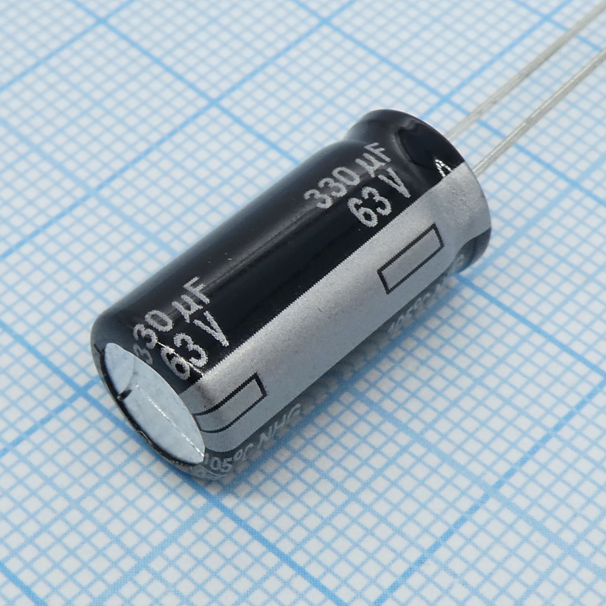 ECA1JHG331 - Конденсатор алюминиевый электролитический 330мкФ 63В 20% (10 X 20мм) радиальные выводы 5мм 510мА 2000час 105°С автомобильного применения Лента в коробке