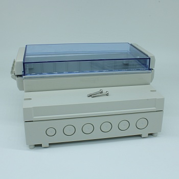 DC005CBU - Двухсекционный корпус IP65 с откидной прозрачной синей крышкой, база ABS светло-серая, крышка из поликарбоната