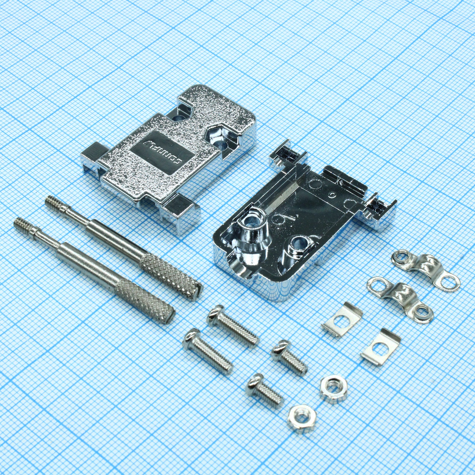 DS1046-09C1L1 - Кожух для разъема D-Sub 9pin с удлиненными винтами, металлизированный