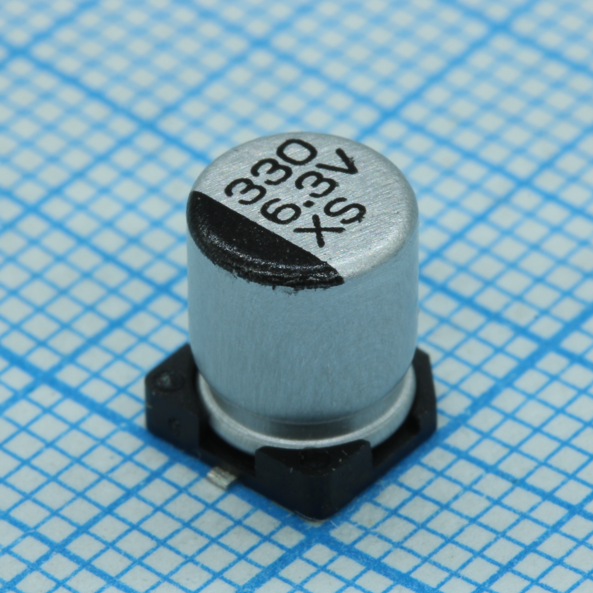 TS13C01E101MGT000R - Конденсатор электролитический стандартный 25В 100мкФ ±20%, 115мА 2000 часов, SMD 6.3х7.7мм