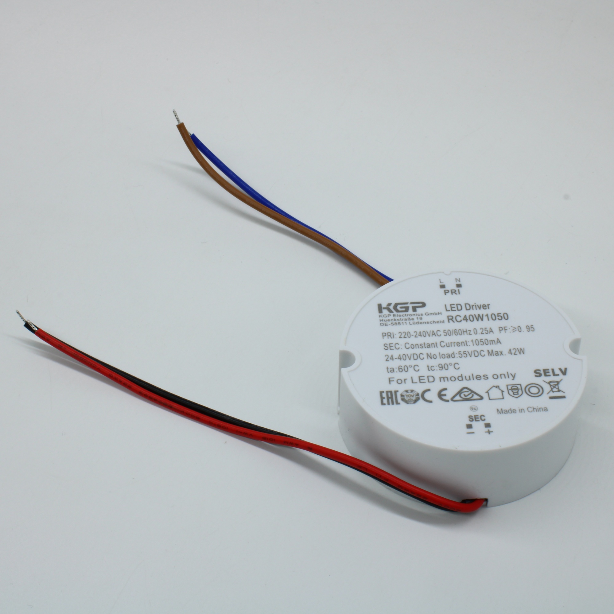 RC40W1050 - AC-DC, 40Вт, токовый выход, вход 198…264В AC, выход 1050мА/24…40В, ККМ, в кожухе Ф70х25 мм, -20…+60°С