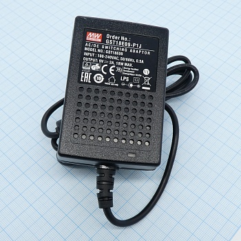 GST18E09-P1J - AC-DC, 18Вт, вход 85...264B AC 47...63 Гц,, выход 9B/2A, изоляция 3000В AC, 79x54x33мм, -30...+70°С, выходной разъем 11, диам. 5.5х2.1мм