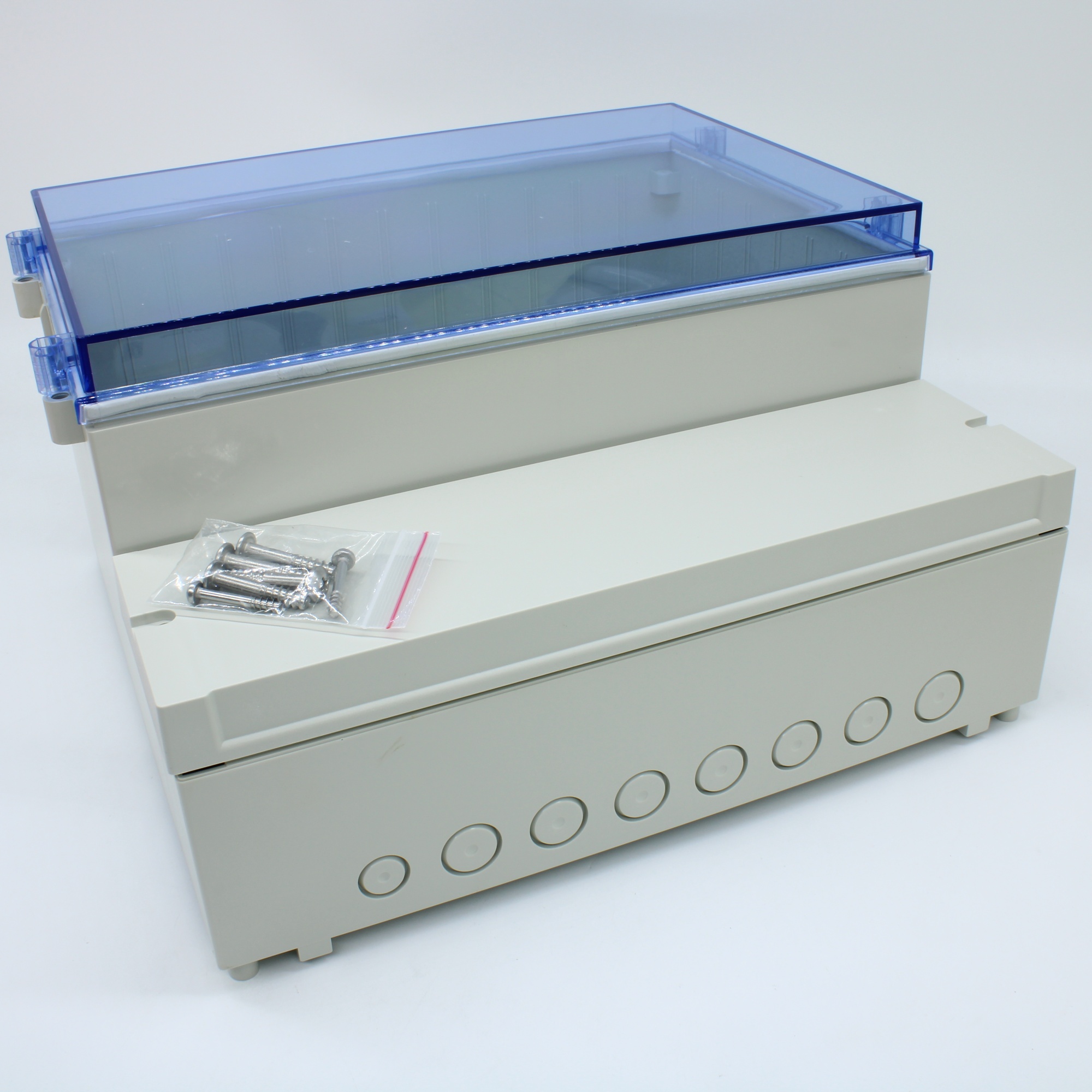 DC009CBUNO - Двухсекционный корпус IP65 с прозрачной синей крышкой на винтах, база ABS светло-серая, крышка из поликарбоната