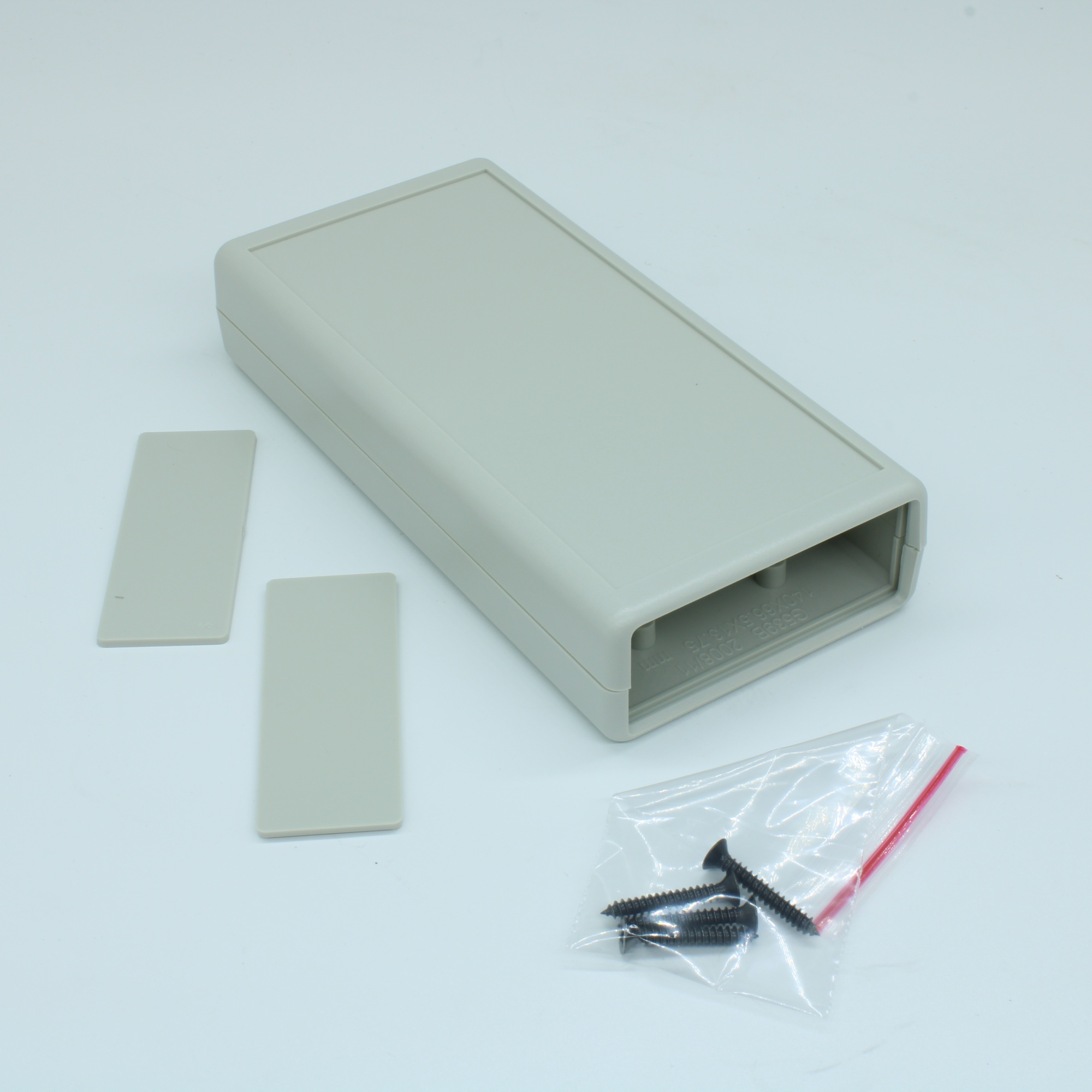 G539G-2$ - Корпус приборный, носимый, материал: ударопрочный пластик ABS, две панели "$", серый