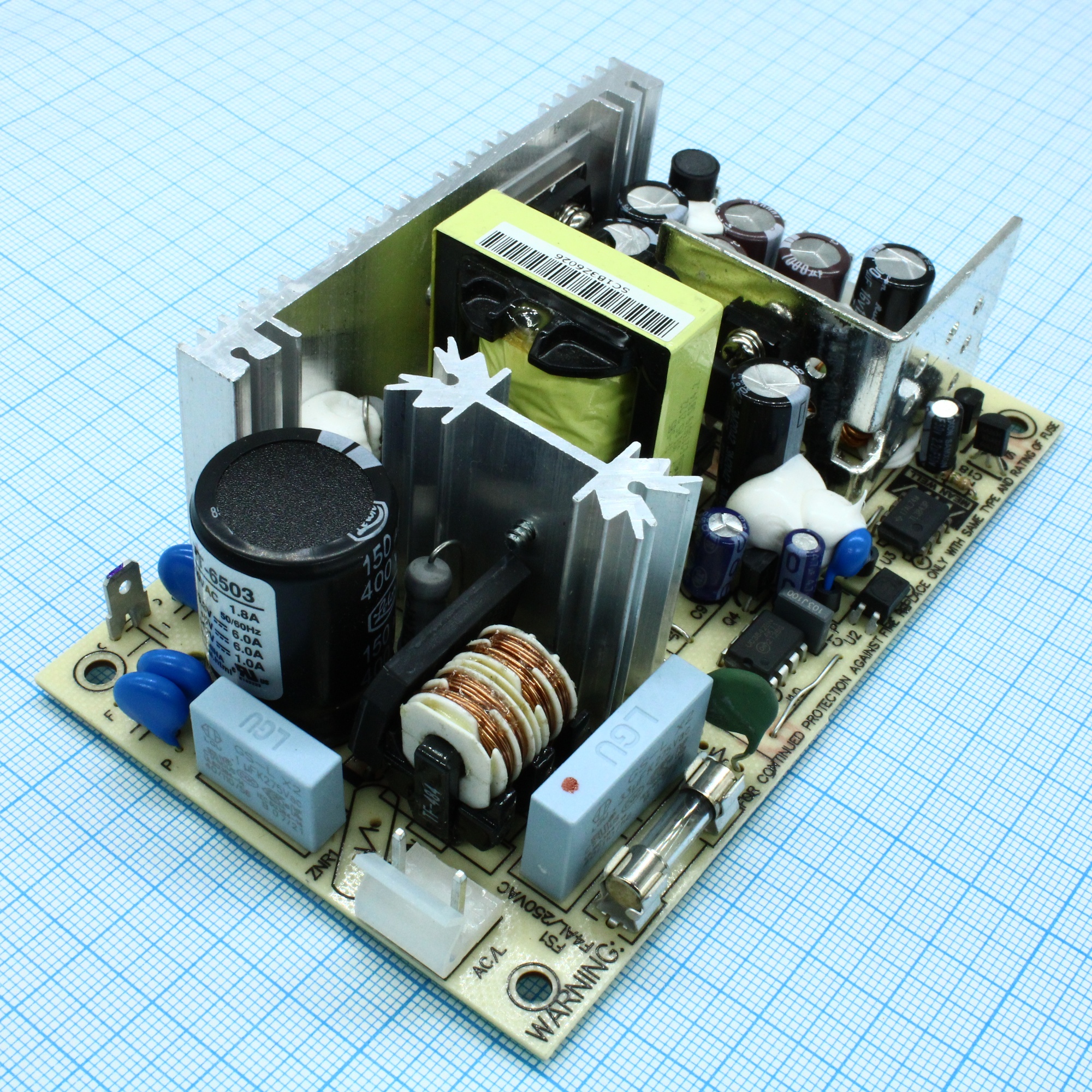 PT-6503 - AC-DC, 65Вт, выход1: +3…3,6В/0…7A, выход2: +5В/0,2…10A, выход3: +12В/0…1,2A, максимальная мощность 61.8Вт, вход 90…264V AC, 47…63Гц /127…370В DC, изоляция 3000В AC, открытая плата 127х76х42мм, -10…+60°С