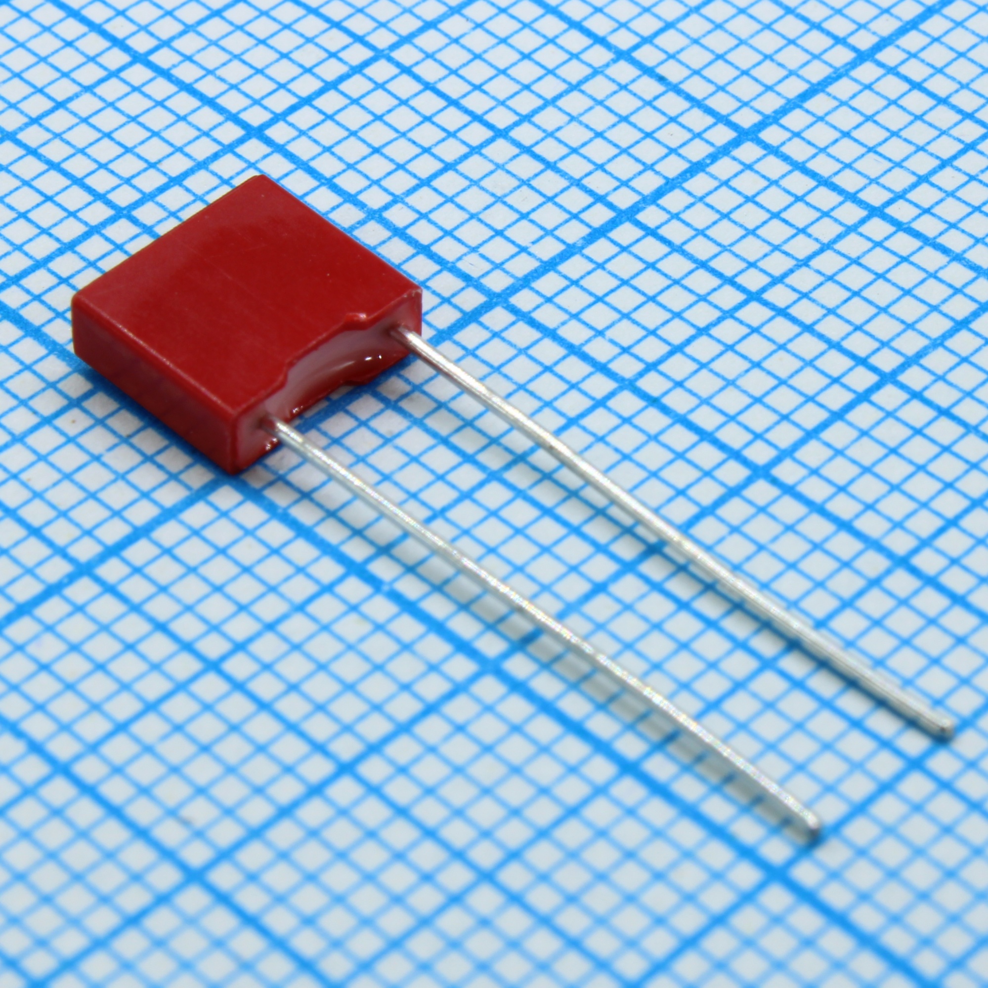 TS05002A104JAB0B0R - Конденсатор металлоплёночный полиэтилентерефталатный 0.1мкФ 100В ±5% (7.2х2.5х6.5мм) шаг выводов 5мм 105°С автомобильного применения лента в коробке